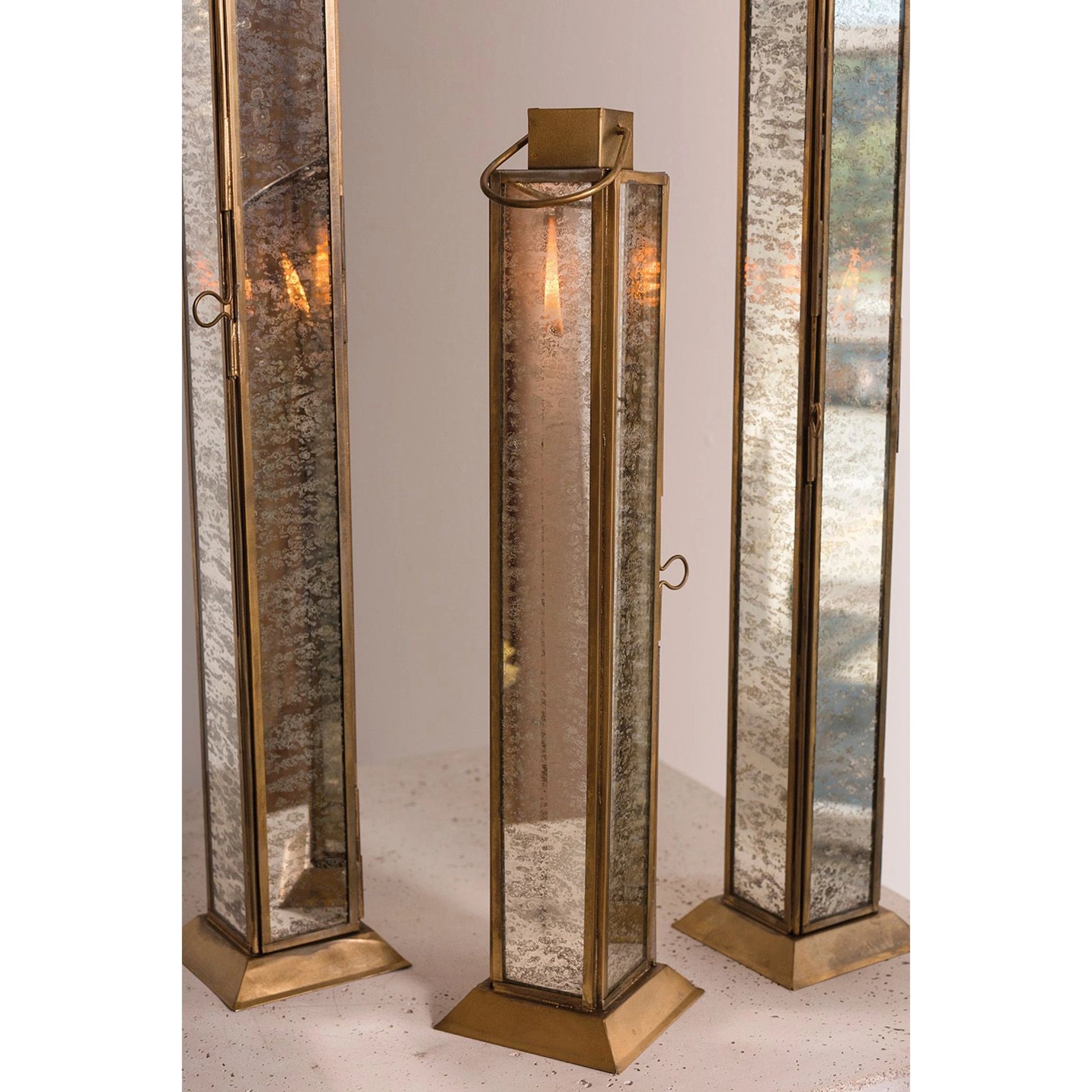 Henley Lantern by Accent Decor in gold. Made from glass in a modern style.