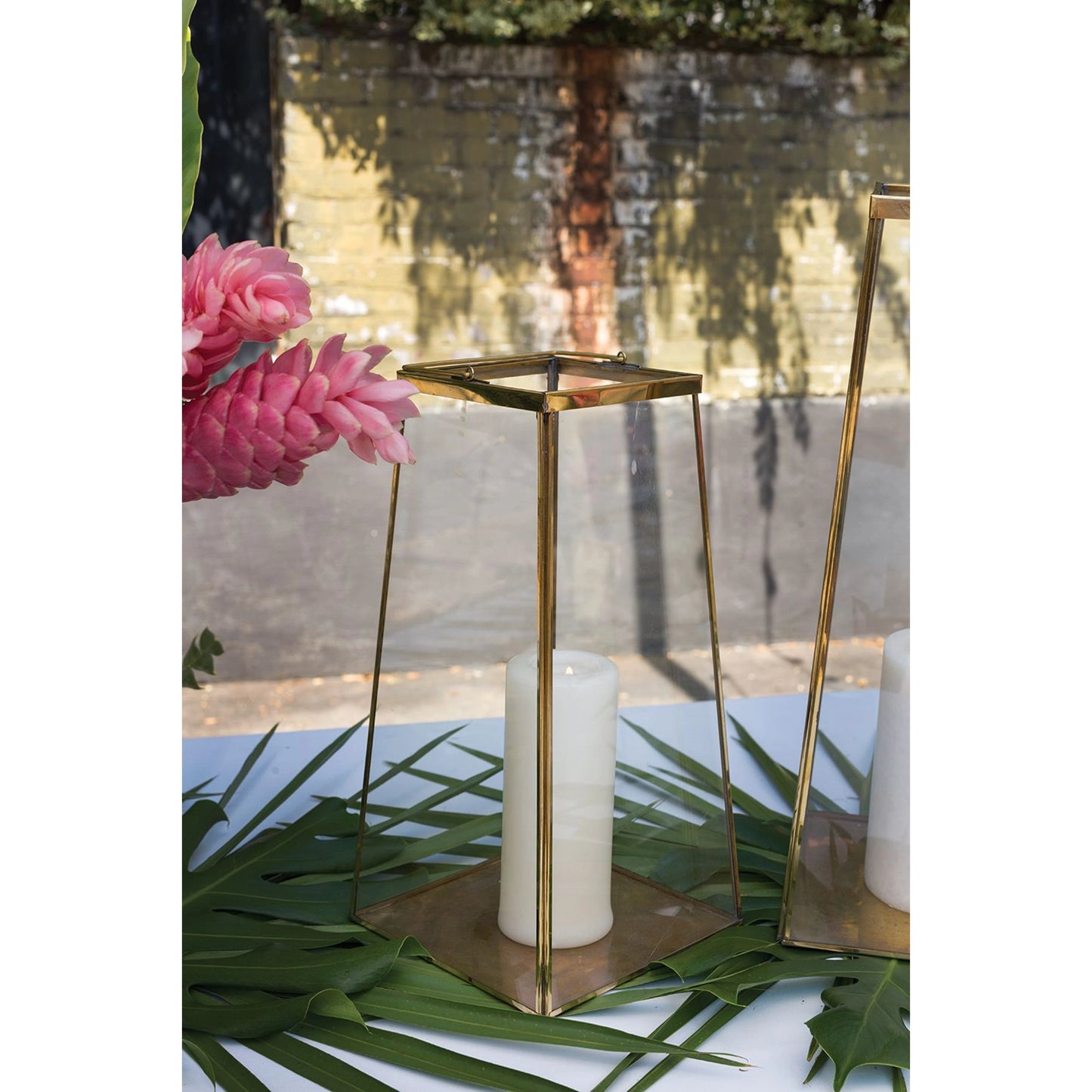 006 SI-2085407 | Lifestyle | Paramount Lantern by Accent Decor in gold. Made from metal in a modern style.