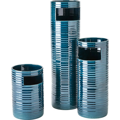 Cut Out Vase by Global Views in dark blue. Made from unique in a eclectic & global style.