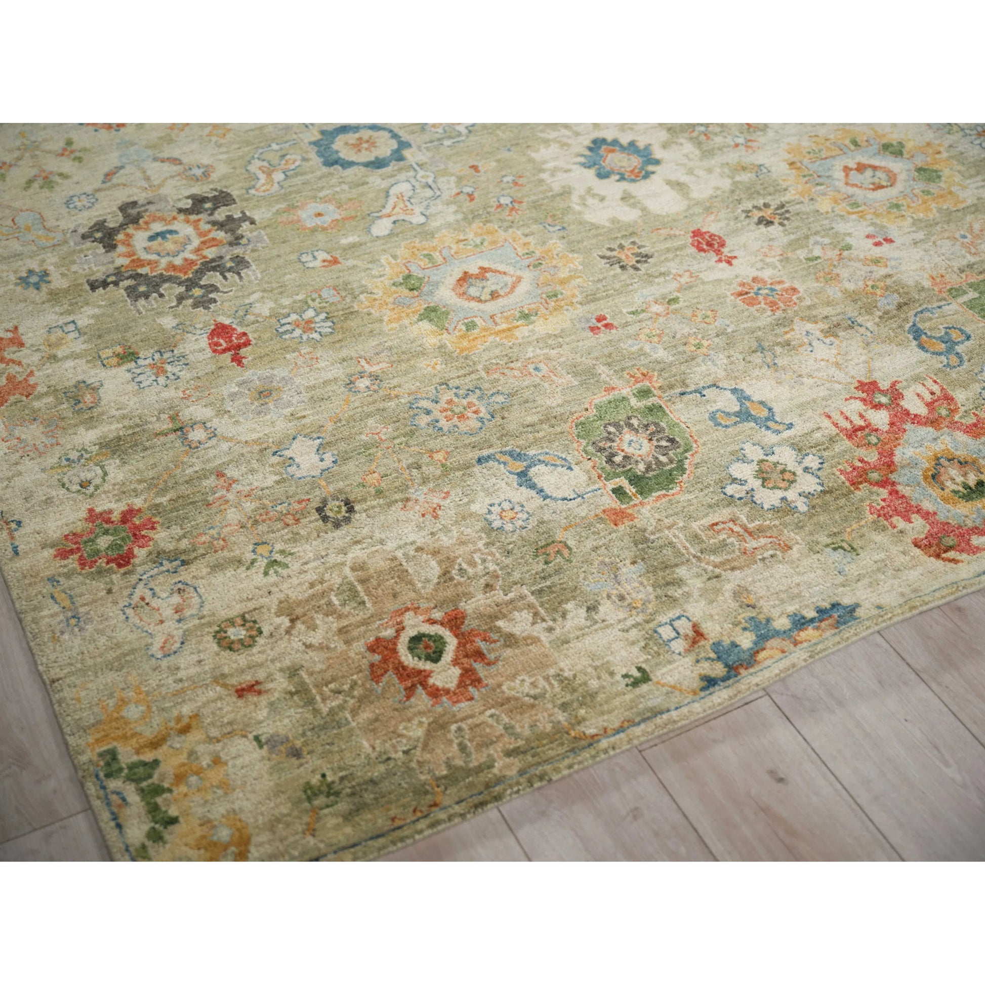 Oxford Flower Rug by Exquisite Rugs in light green. Made from ghazni wool in a unique style.