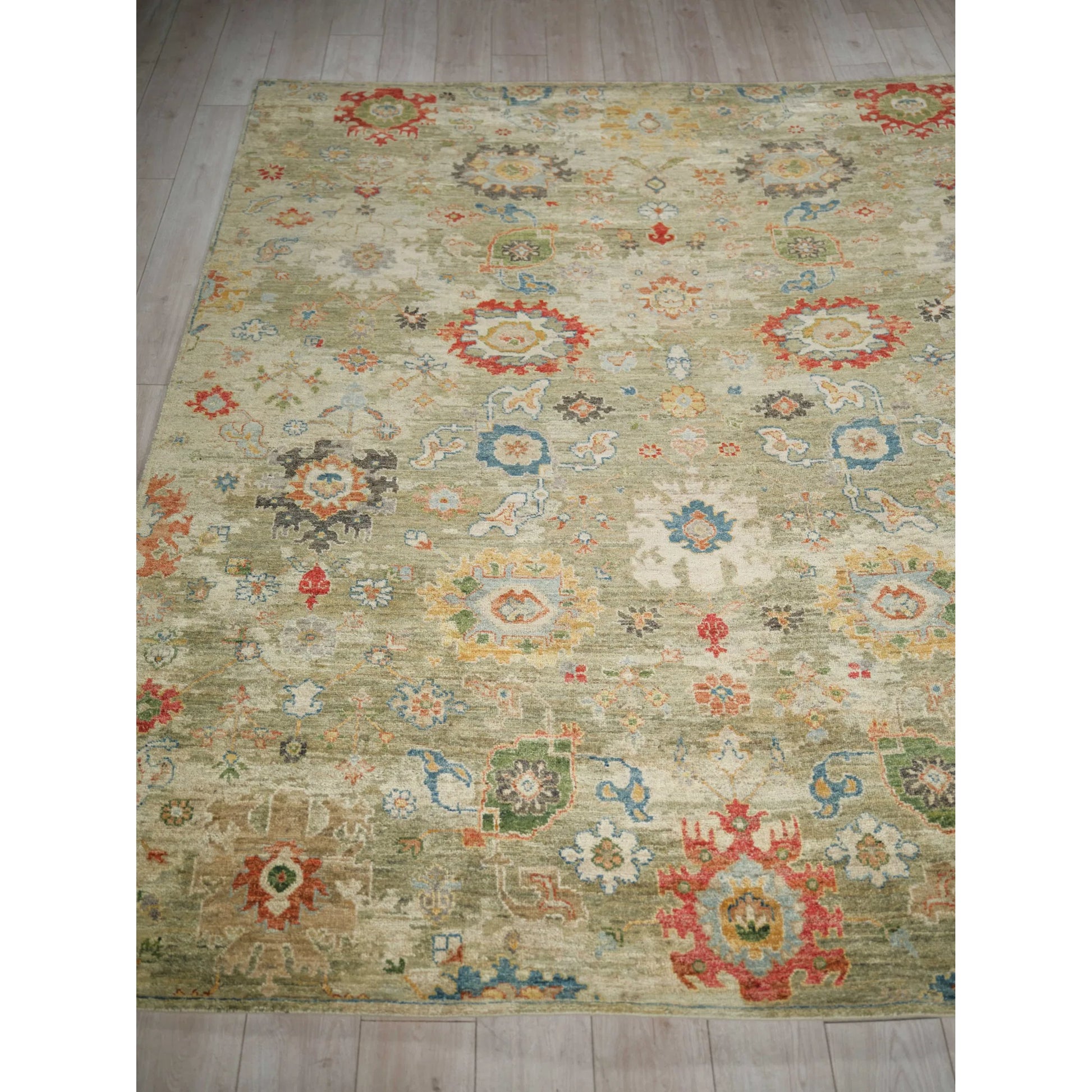Oxford Flower Rug by Exquisite Rugs in light green. Made from ghazni wool in a unique style.