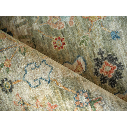 Oxford Flower Rug by Exquisite Rugs in light green. Made from ghazni wool in a unique style.