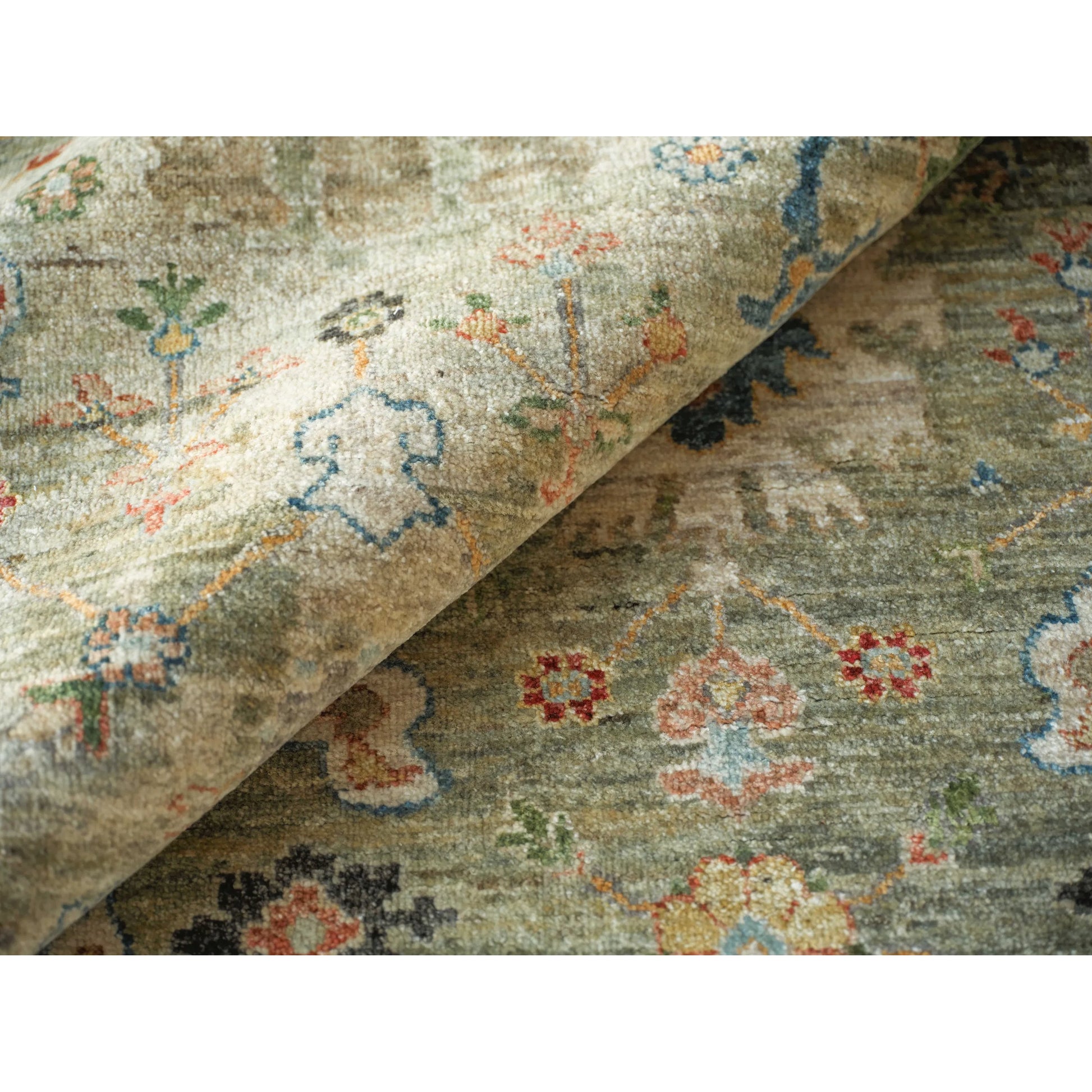 Oxford Flower Rug by Exquisite Rugs in light green. Made from ghazni wool in a unique style.