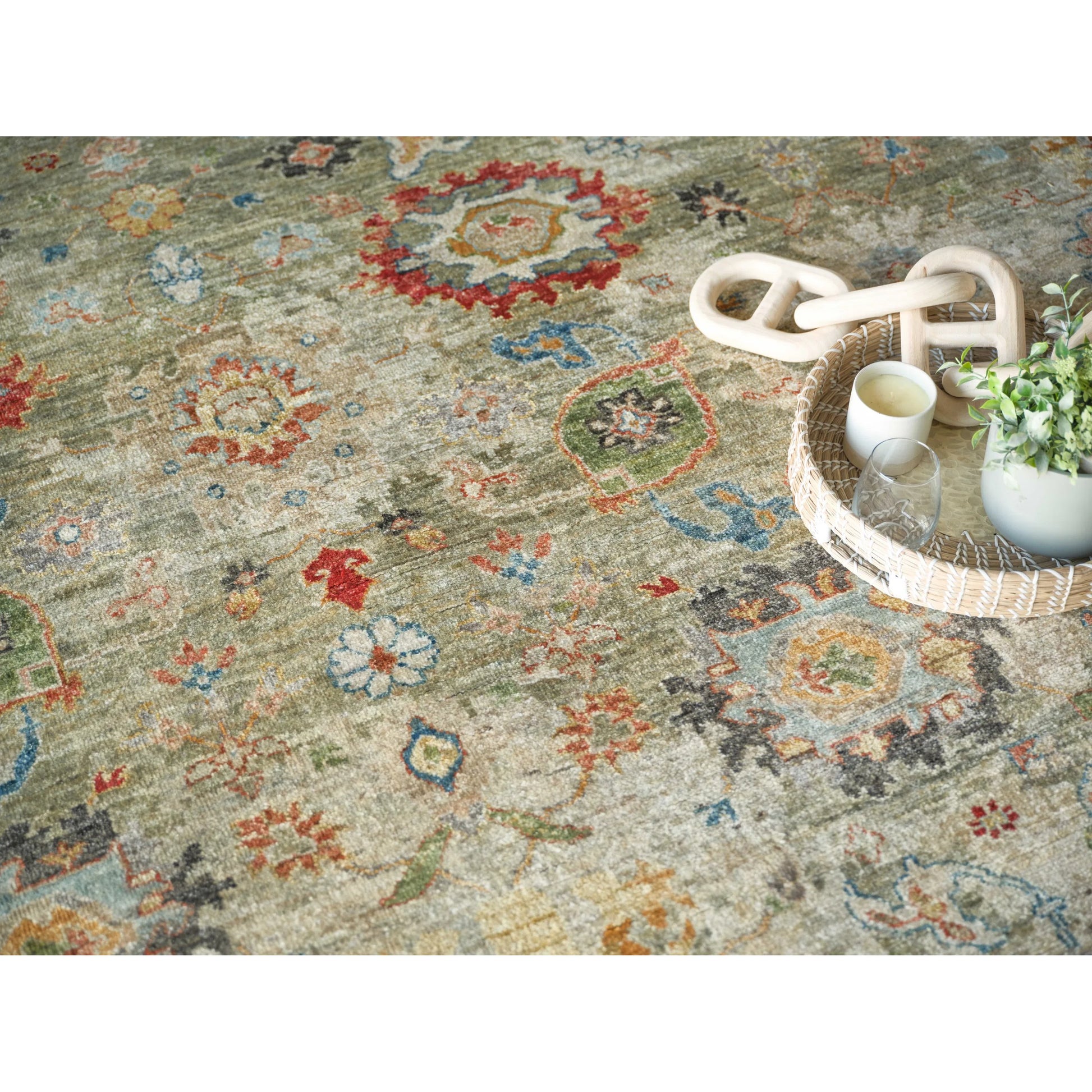 Oxford Flower Rug by Exquisite Rugs in light green. Made from ghazni wool in a unique style.