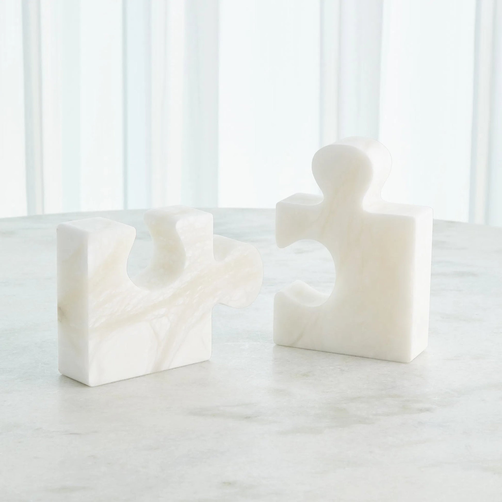 Alabaster Jigsaw Bookends by Global Views. Made from alabaster in a eclectic & global style.