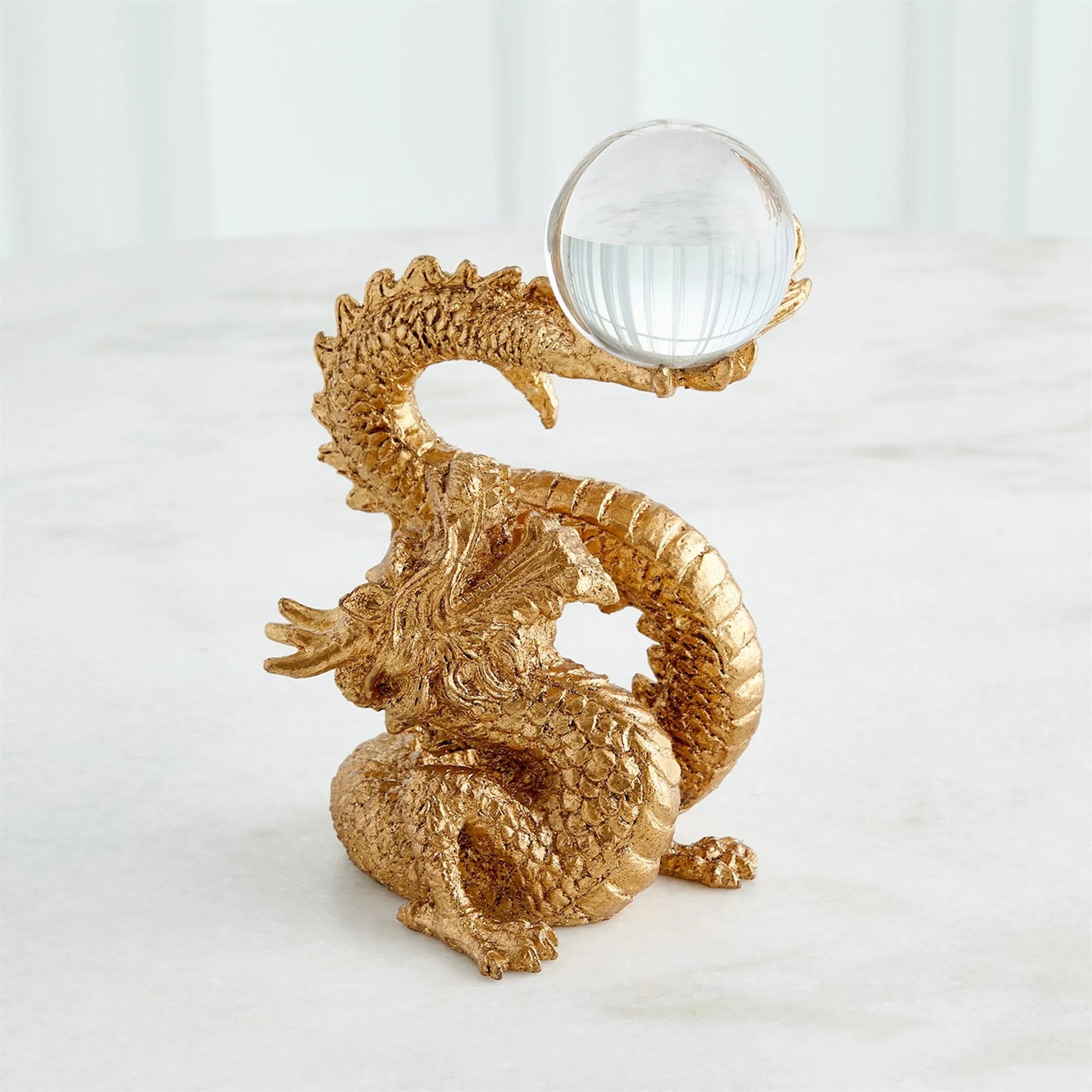 Dragon Holding Sphere by Global Views in gold. Made from unique in a modern style.