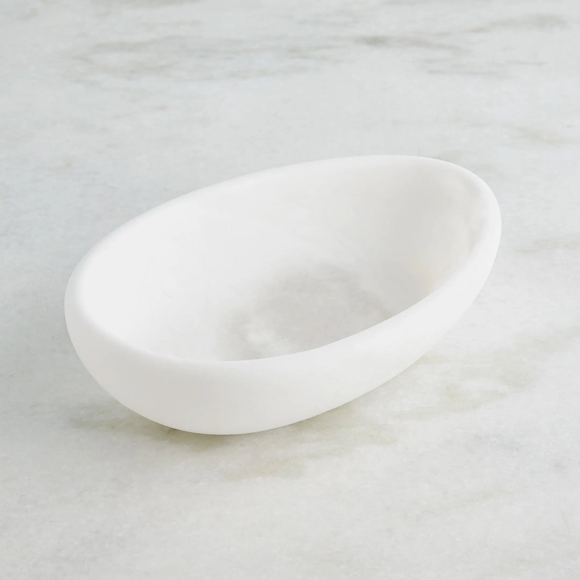 Oblique Alabaster Bowl by Global Views in white. Made from alabaster in a unique style.