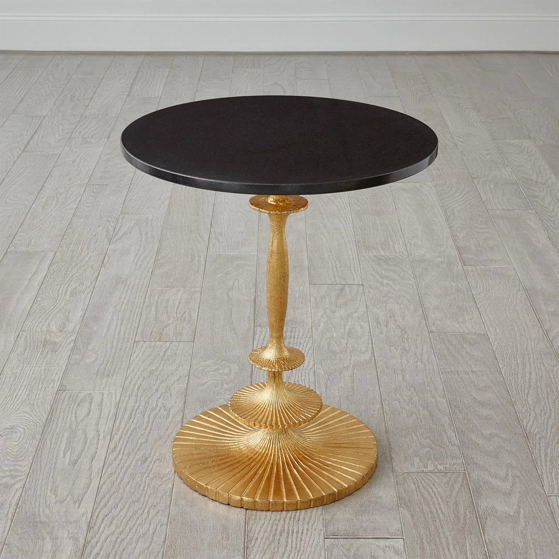 Fluted Side Table by Global Views in gold. Made from unique in a modern style.