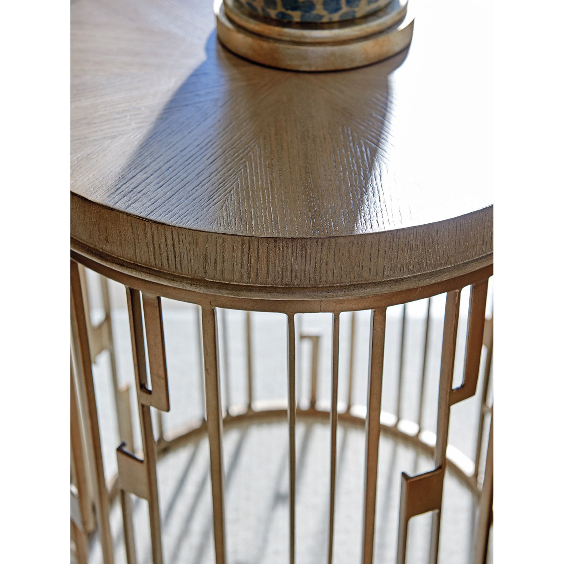 Studio Round Accent Table by Lexington in burnished silver leaf. Made from unique in a transitional style.