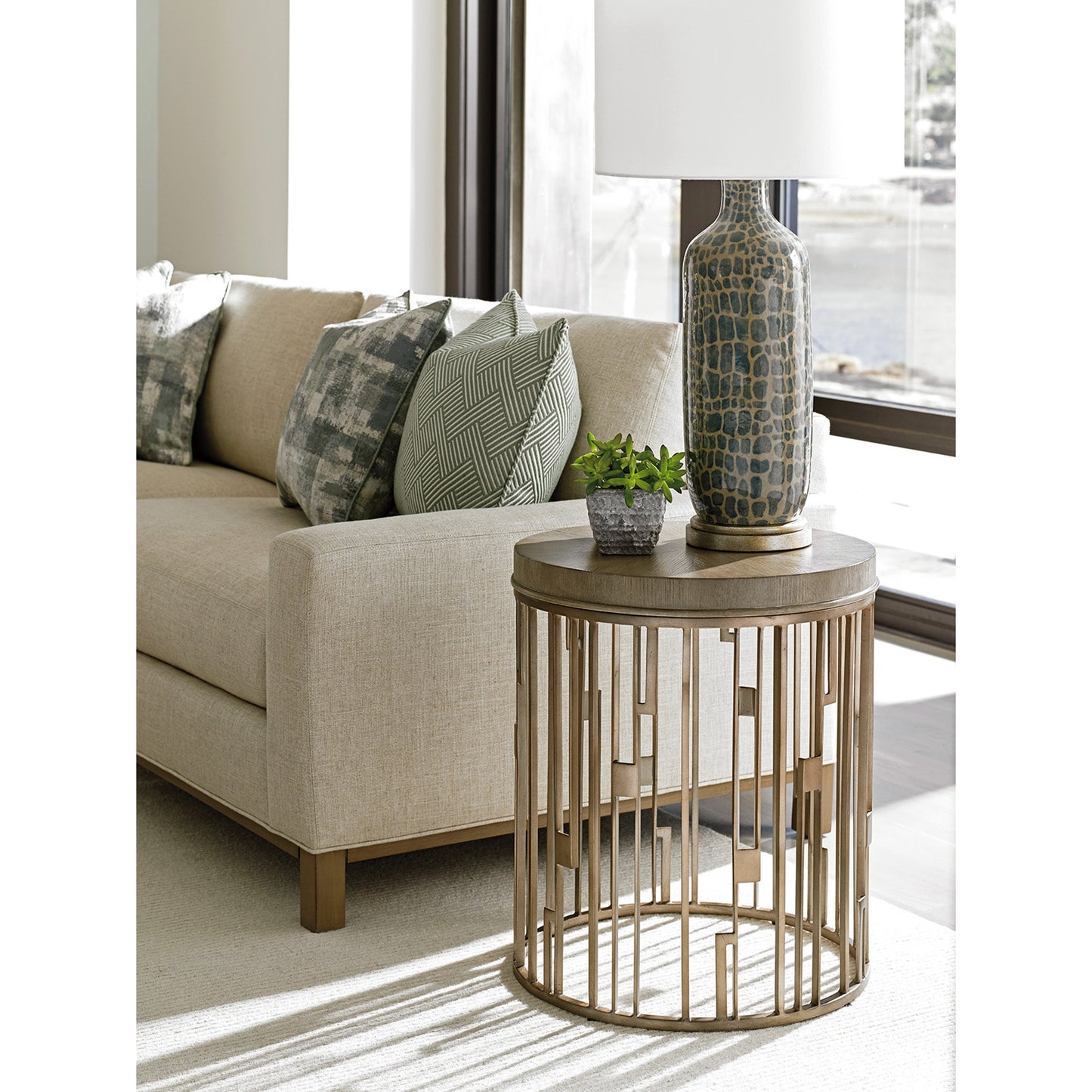 001 SR-835725 | Lifestyle | Studio Round Accent Table by Lexington in burnished silver leaf. Made from unique in a transitional style.