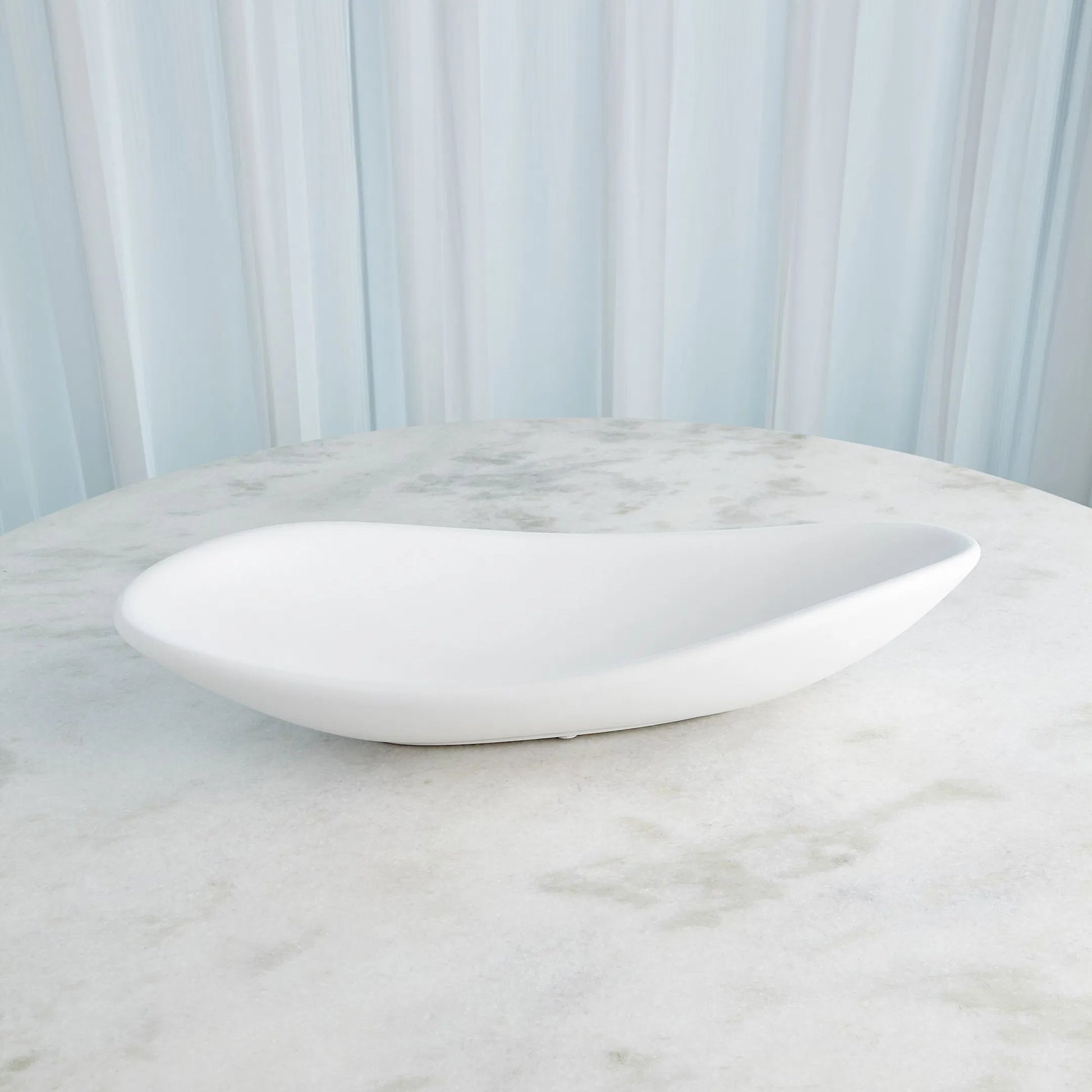 Oblong Platter Bowl by Global Views. Made from ceramic in a modern style.