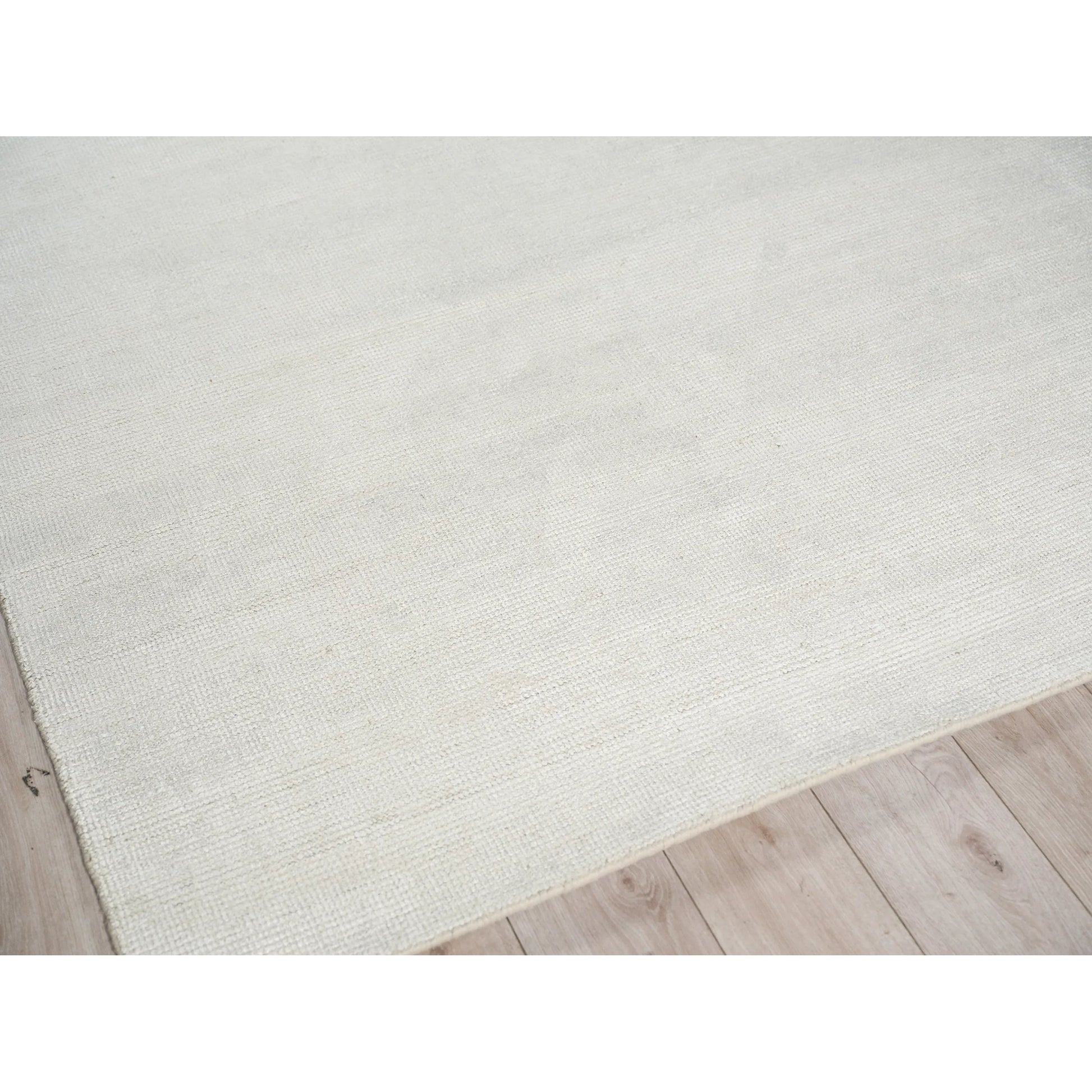 Catalina 7283 Rug by Exquisite Rugs in ivory. Made from wool, bamboo silk in a unique style.