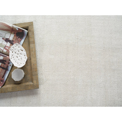 Catalina 7283 Rug by Exquisite Rugs in ivory. Made from wool, bamboo silk in a unique style.