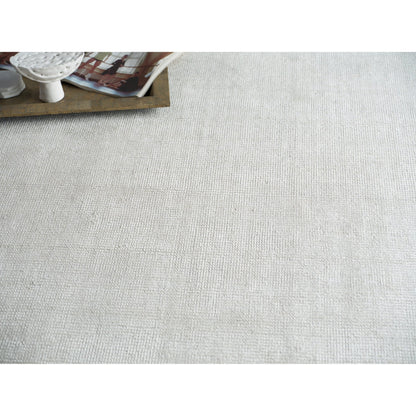 Catalina 7283 Rug by Exquisite Rugs in ivory. Made from wool, bamboo silk in a unique style.