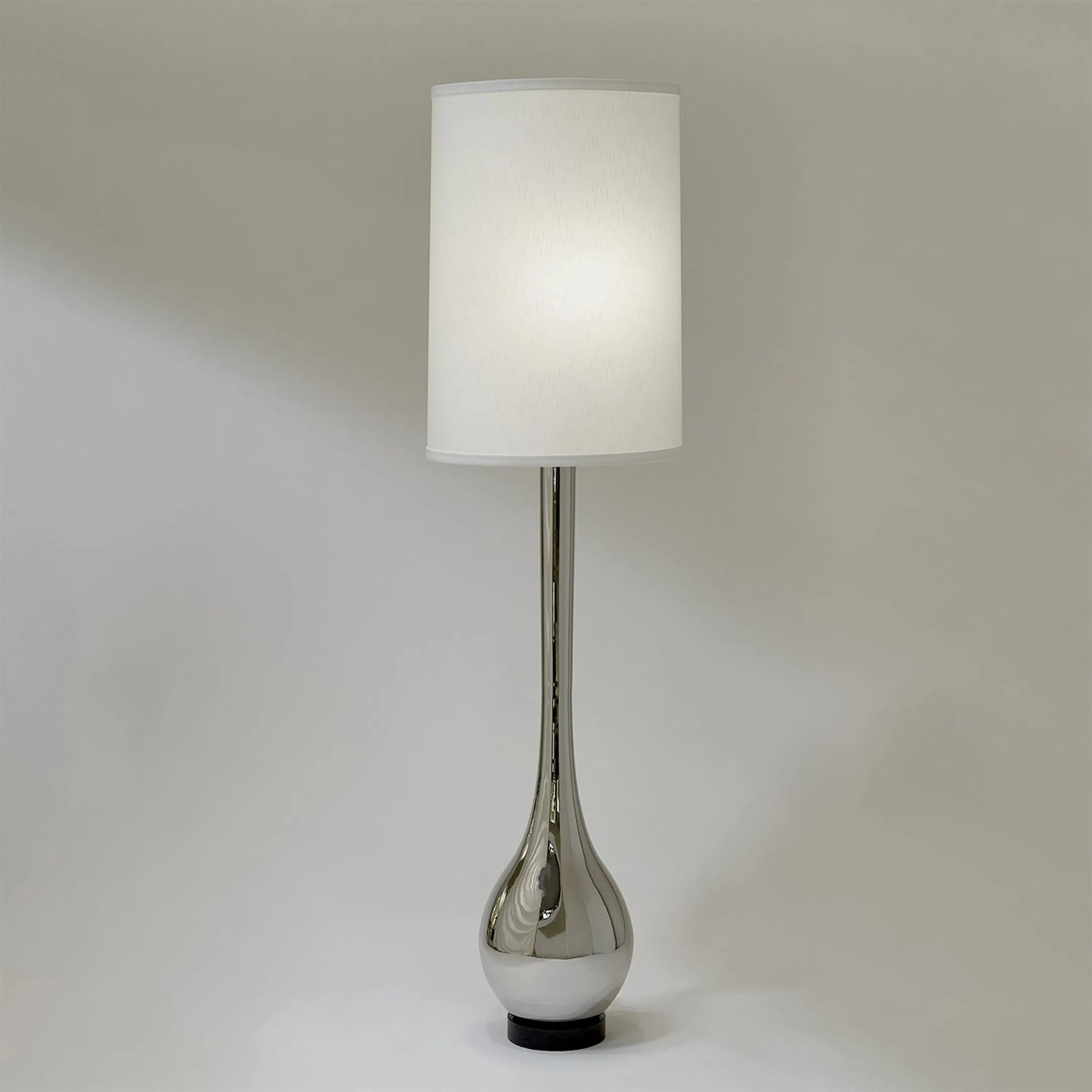Bulb Floor Lamp by Global Views. Made from brass, granite in a transitional style.