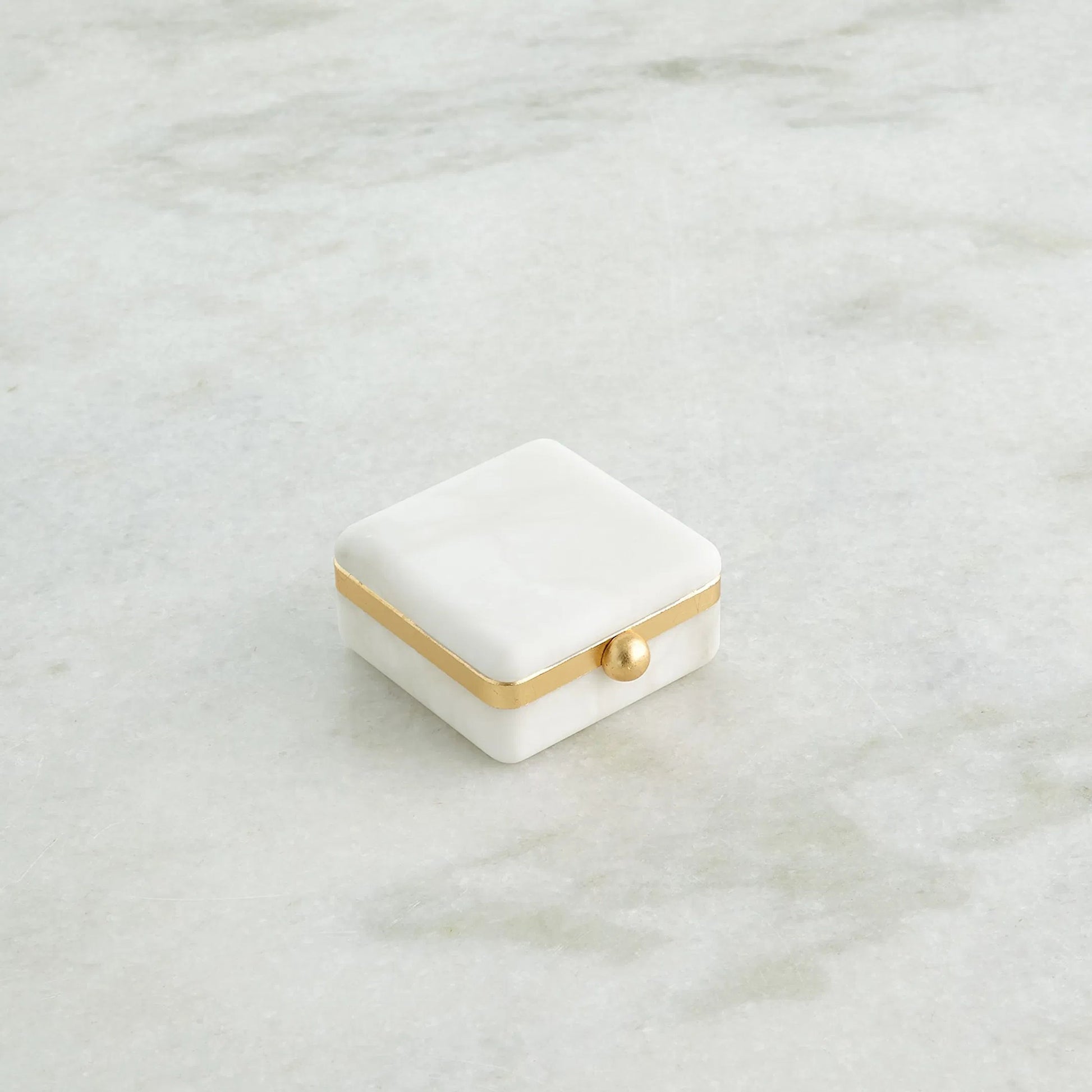 Gold Band Swivel Alabaster Box by Global Views in natural. Made from alabaster, metal in a modern style.