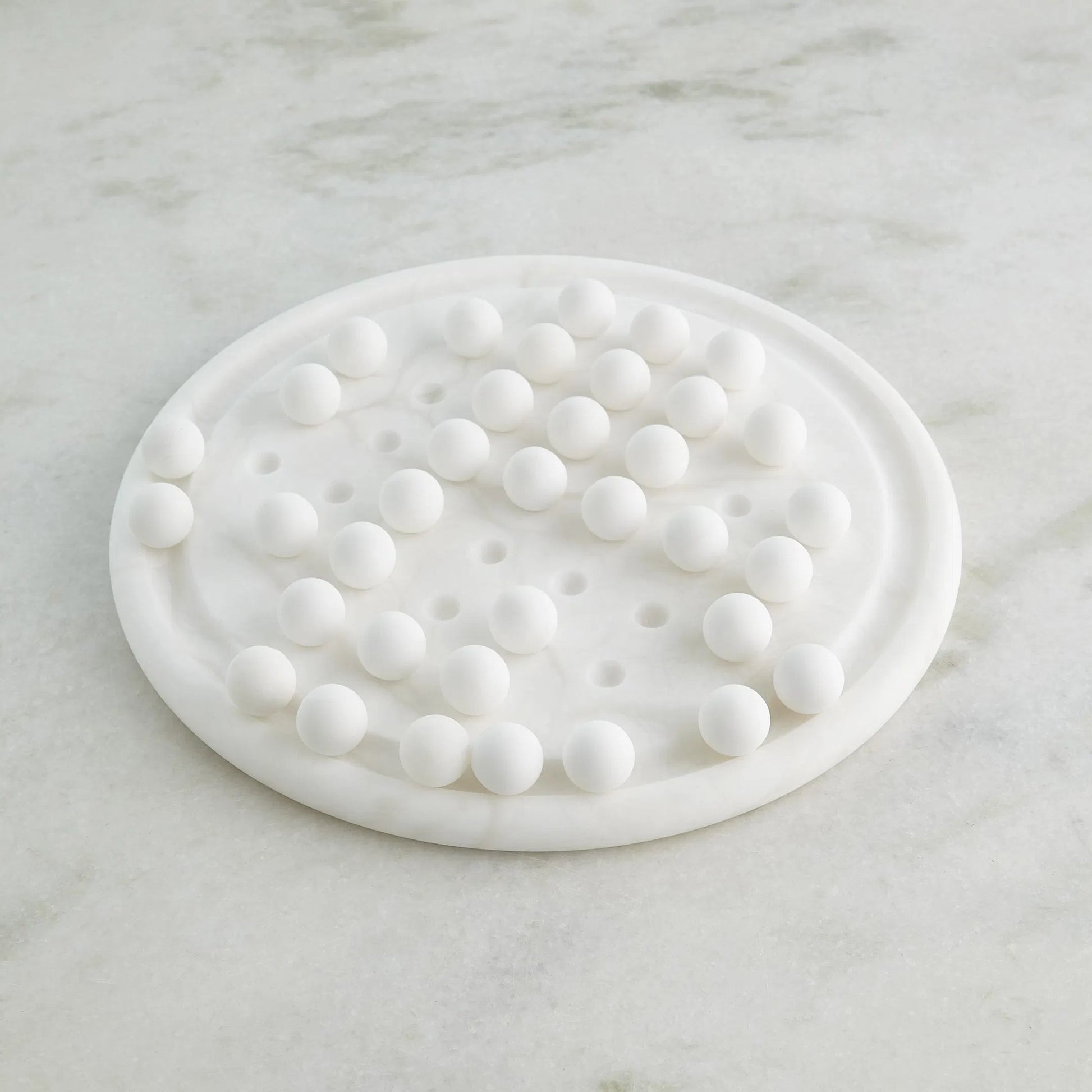 Alabaster Solitaire Game Set by Global Views. Made from alabaster in a modern style.
