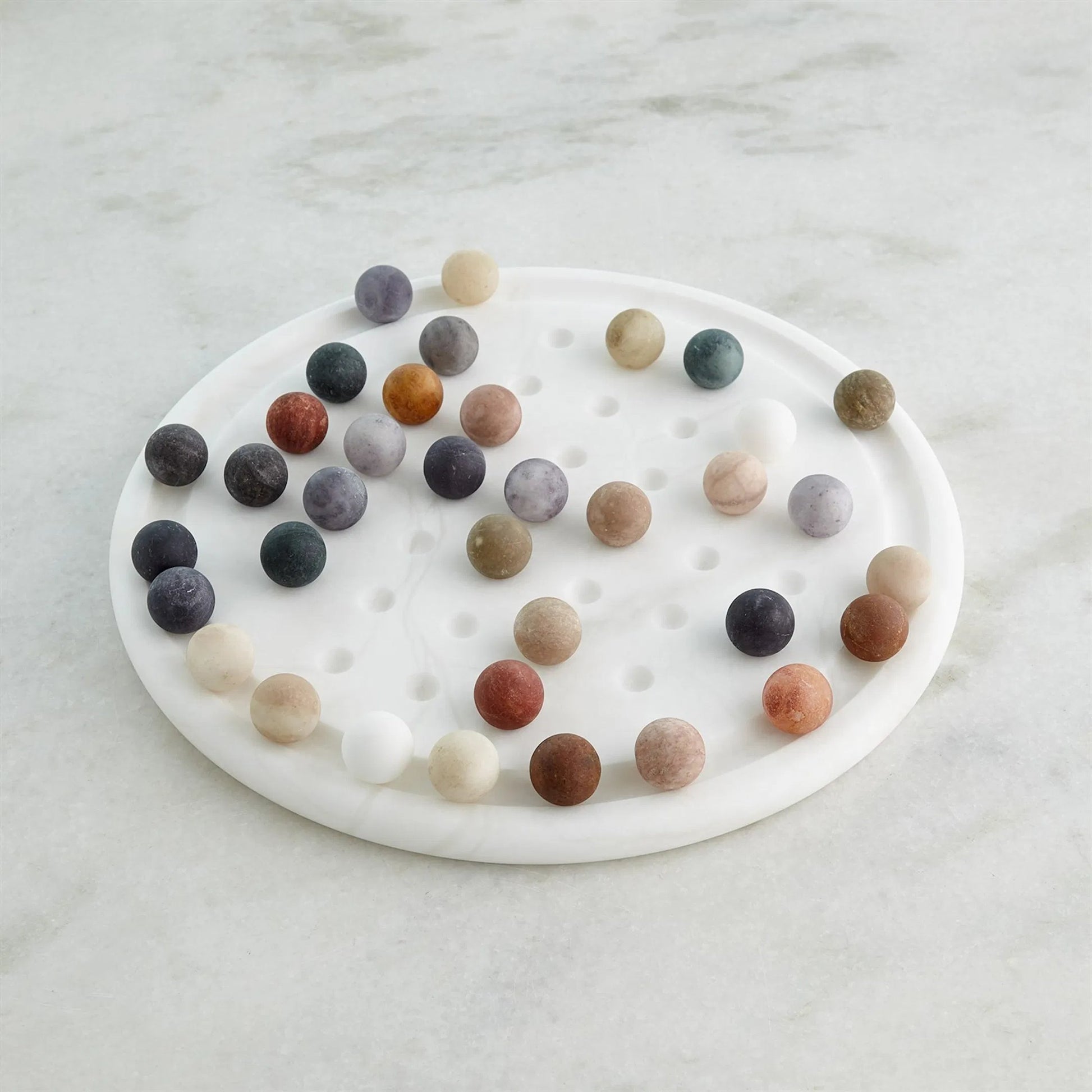 Alabaster Solitaire Game Set by Global Views. Made from alabaster in a modern style.