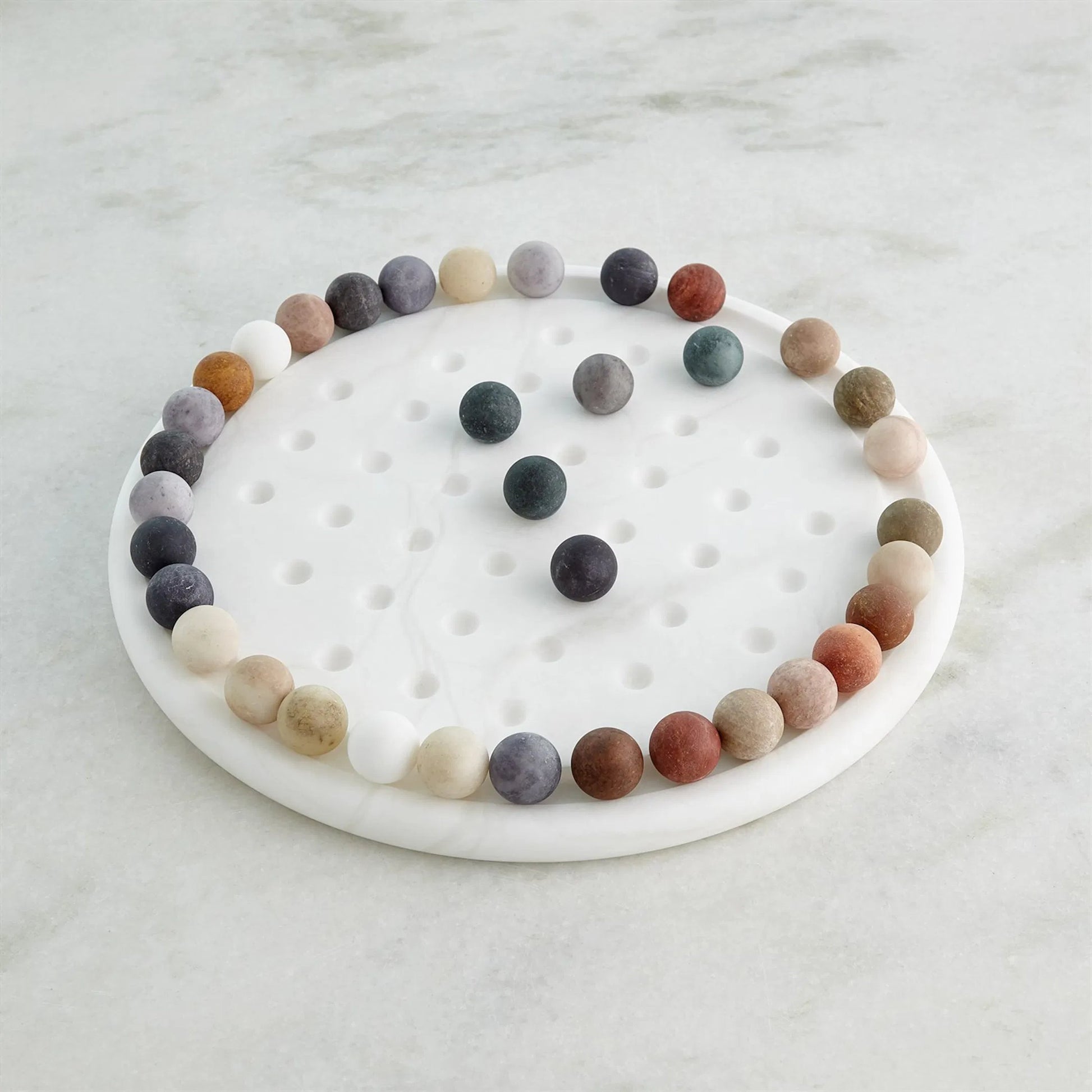 Alabaster Solitaire Game Set by Global Views. Made from alabaster in a modern style.