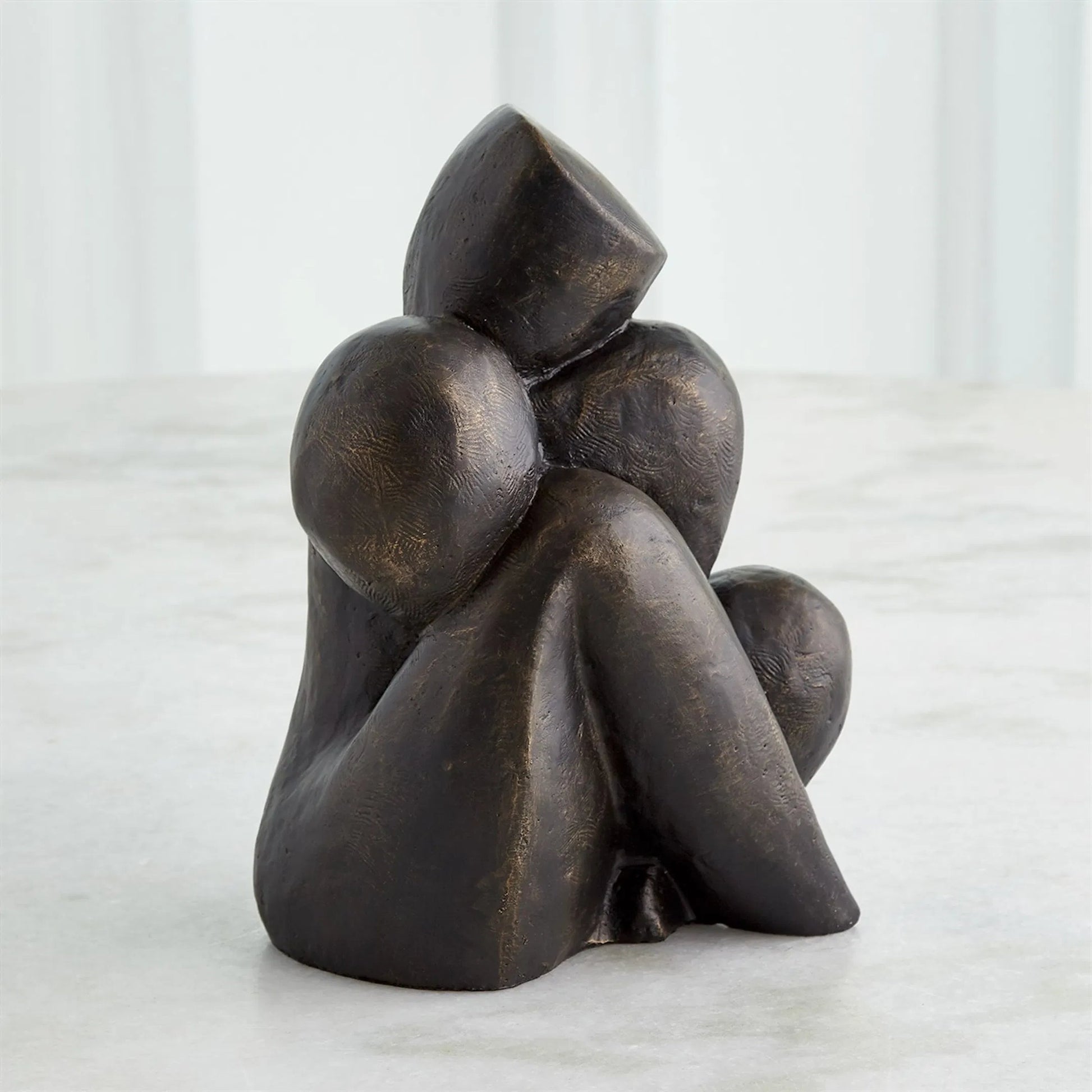 Figural Sculpture by Global Views in bronze. Made from unique in a modern style.