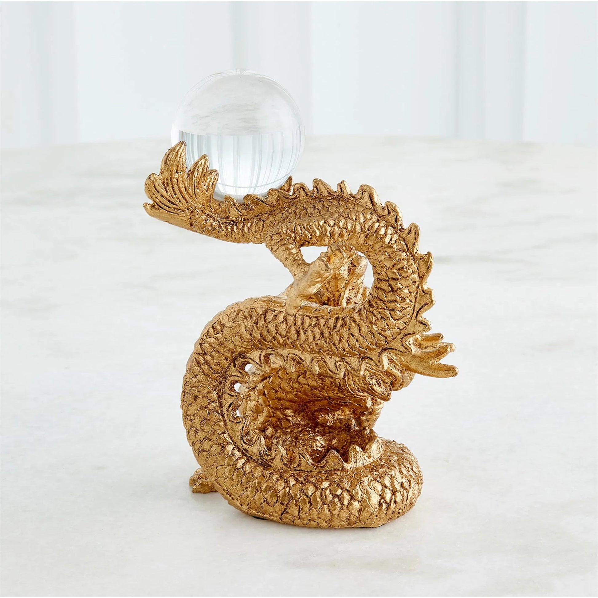 Dragon Holding Sphere by Global Views in gold. Made from unique in a modern style.