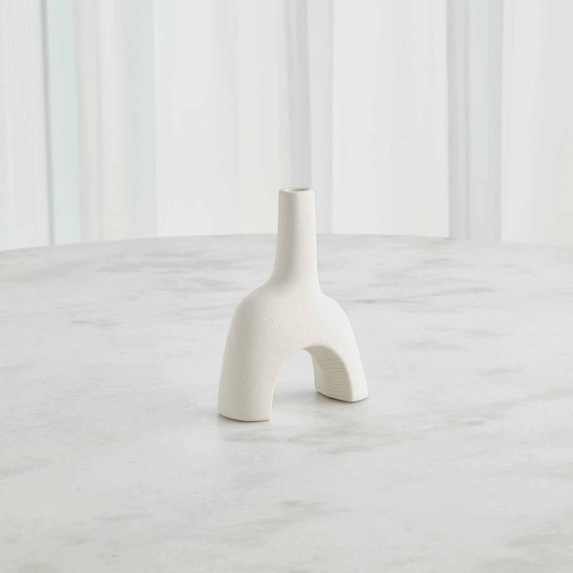 Cassel Vase by Global Views in matte white. Made from ceramic in a modern style.