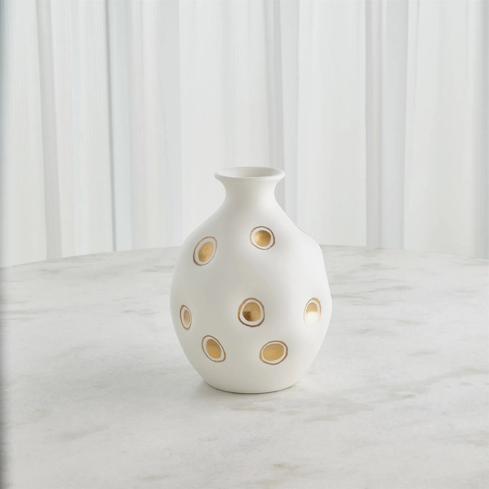 Dimples Vase by Global Views in gold. Made from unique in a rustic style.