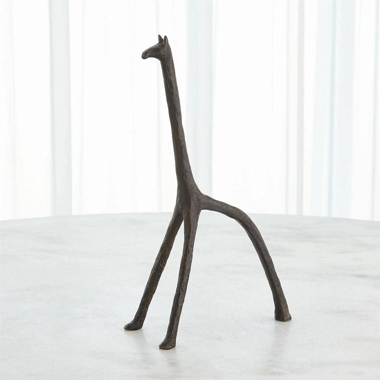 004 SI-2323807 | Lifestyle | Iron Giraffe by Global Views in bronze. Made from unique in a modern style.