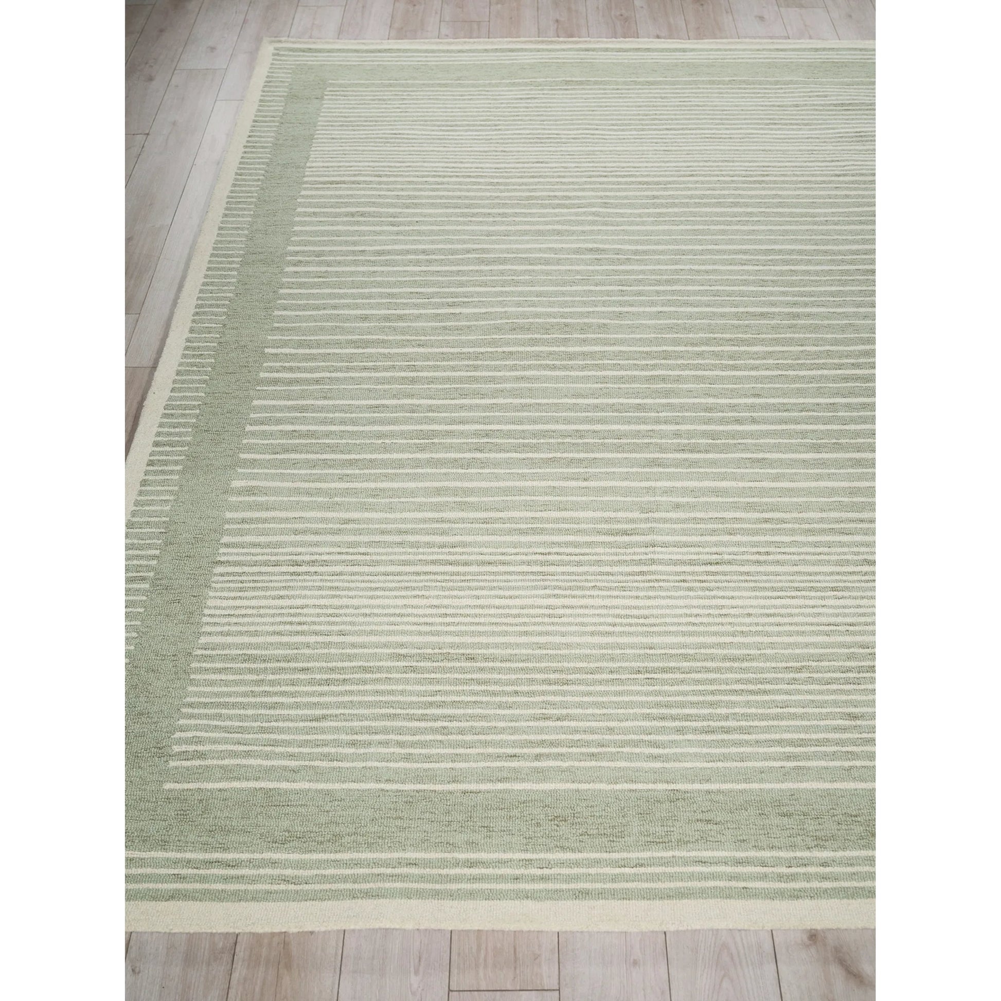 Dusseldorf 7343 Rug by Exquisite Rugs in sage green, ivory. Made from new zealand wool in a unique style.