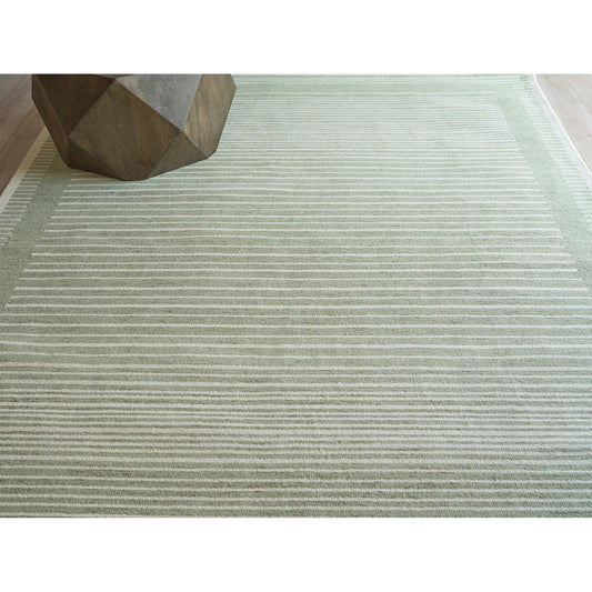 Dusseldorf 7343 Rug by Exquisite Rugs in sage green, ivory. Made from new zealand wool in a unique style.