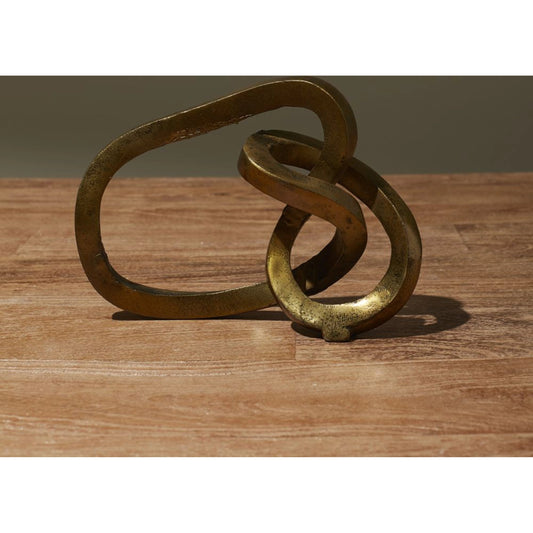 Nudo Sculpture by Accent Decor in gold. Made from metal in a modern style.