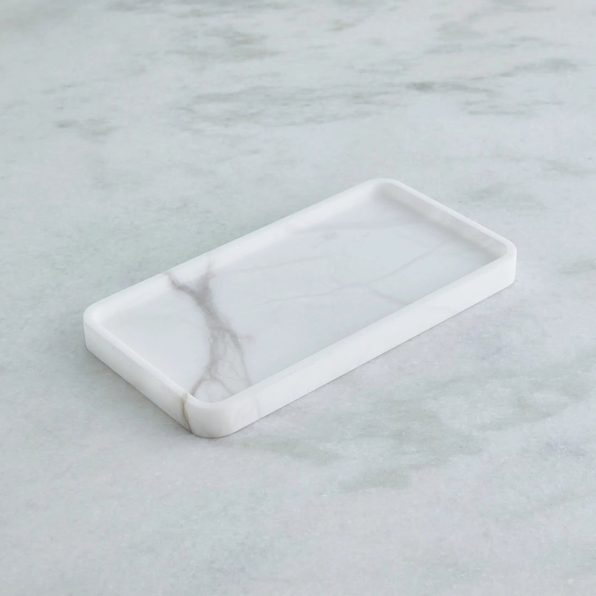 Raggio Alabaster Tray by Global Views in white. Made from alabaster in a unique style.