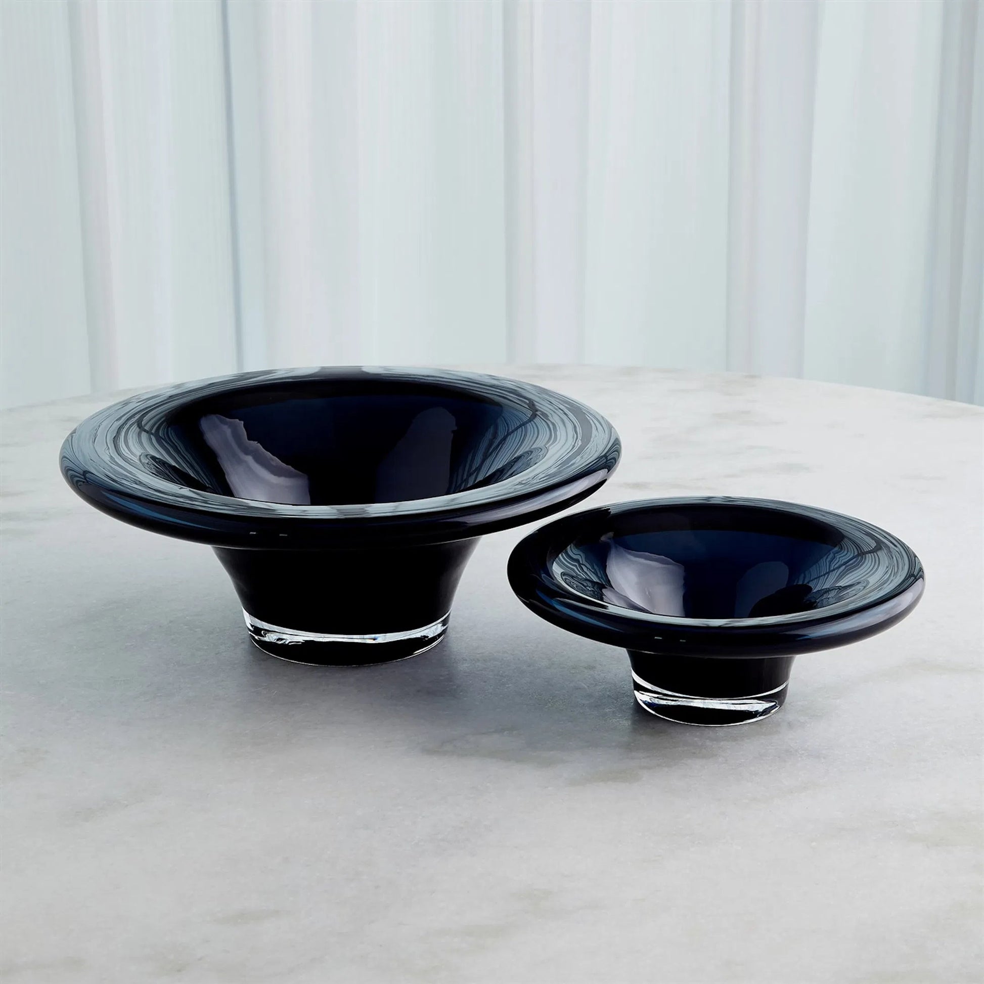 Tourneau Bowl by Global Views. Made from art glass in a eclectic & global style.
