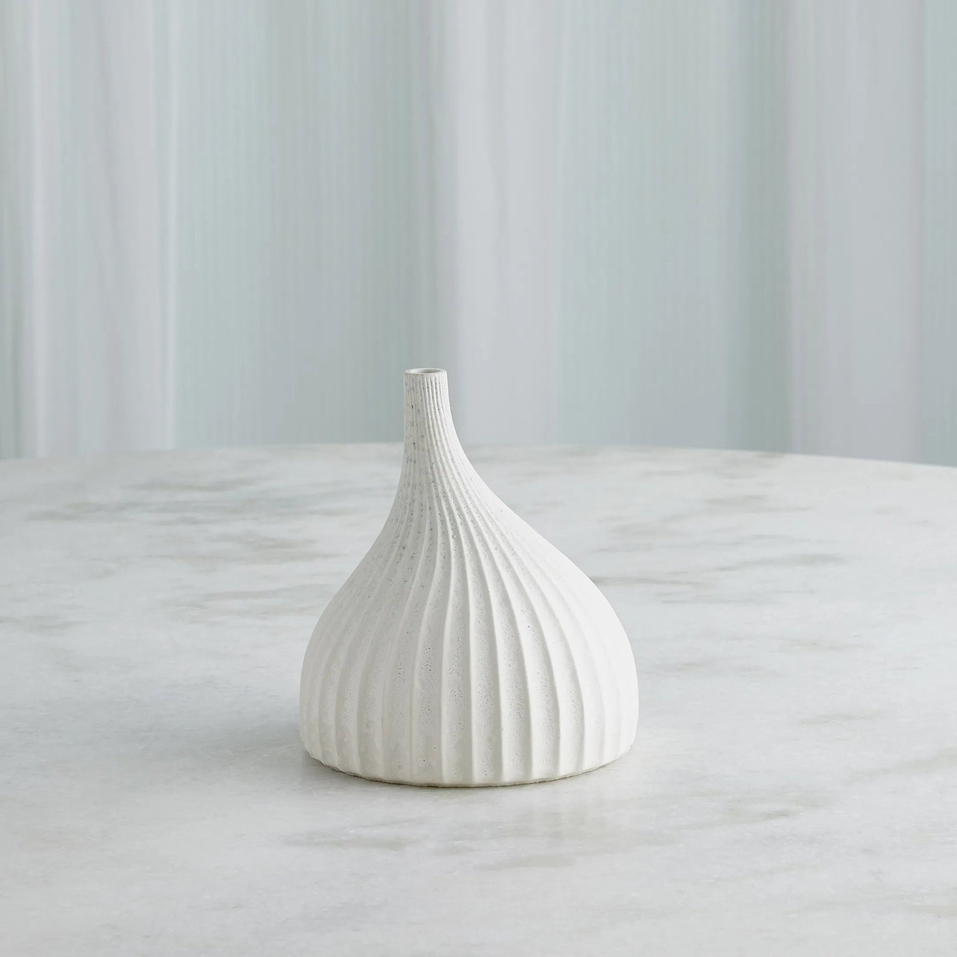 Dewdrop Vase by Global Views in white. Made from earthenware in a modern style.