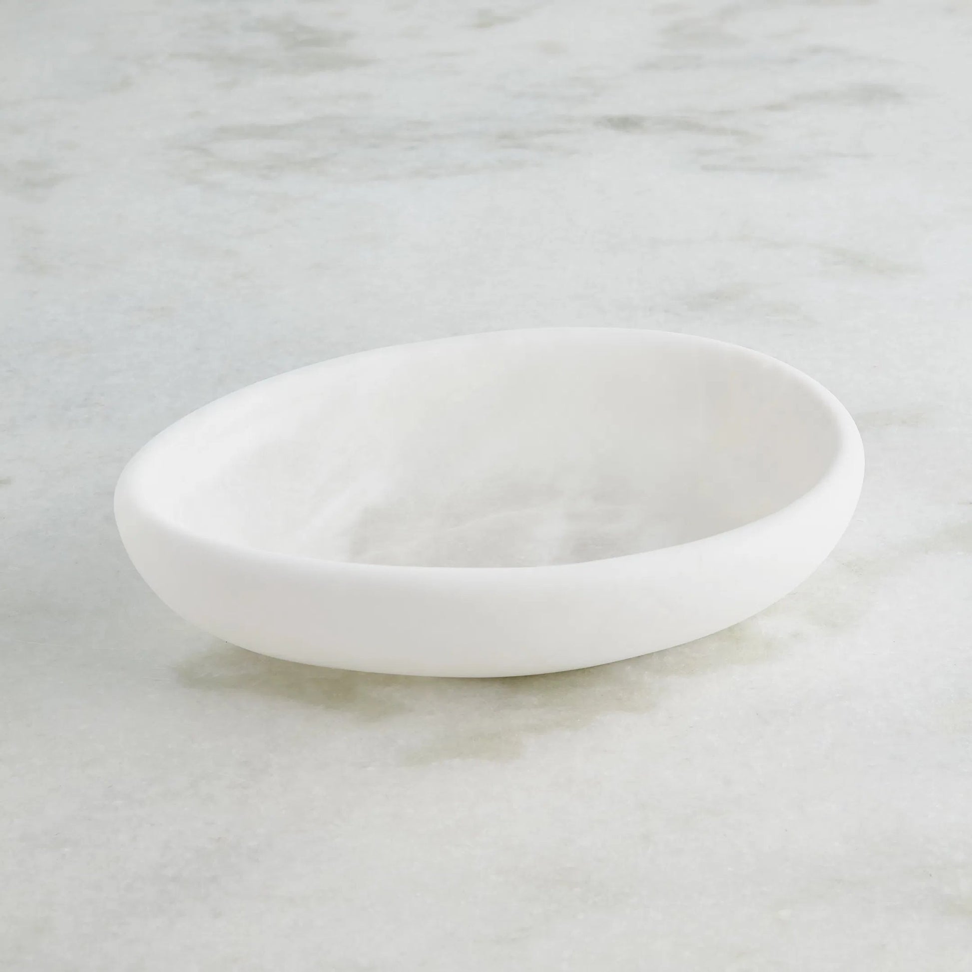 Oblique Alabaster Bowl by Global Views in white. Made from alabaster in a unique style.
