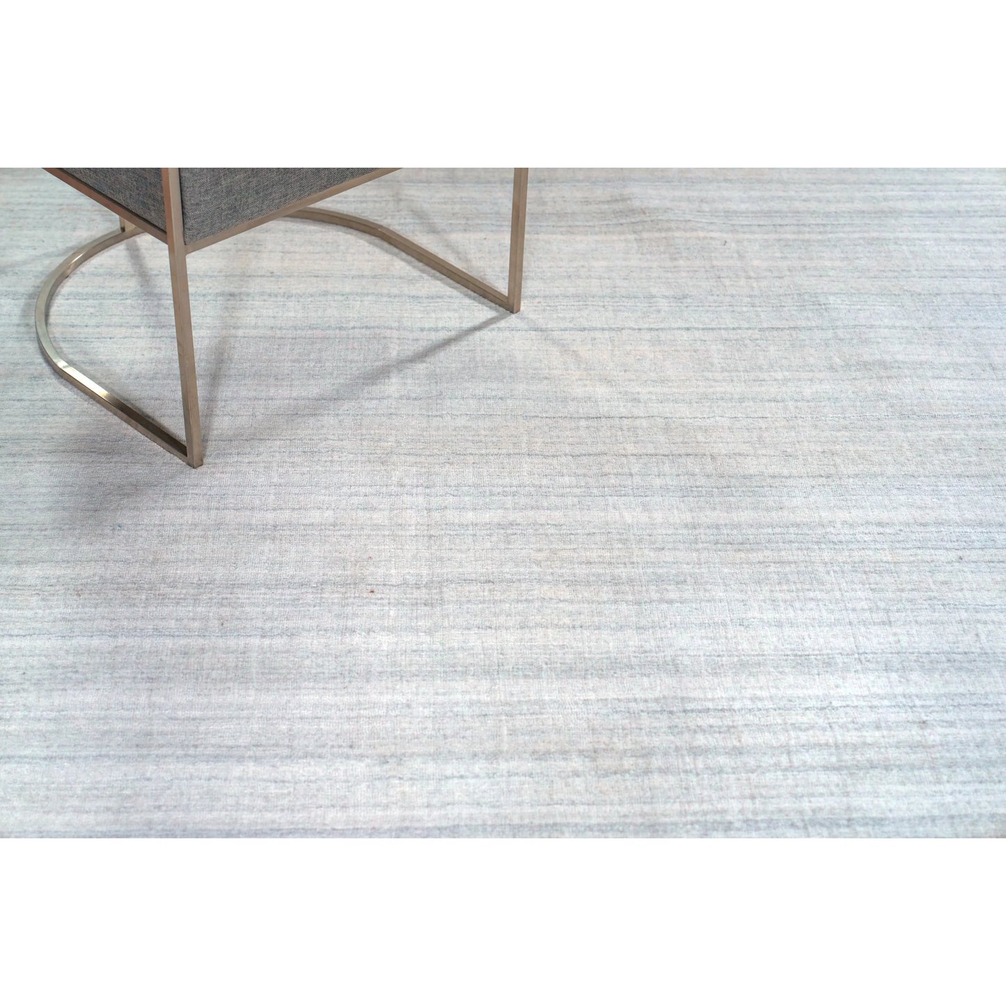 006 SI-2543590,SI-2543591,SI-2543594,SI-2543595 | Lifestyle | Serenity 7388 Indoor/Outdoor Rug by Exquisite Rugs in light grey, ivory. Made from pet in a unique style.