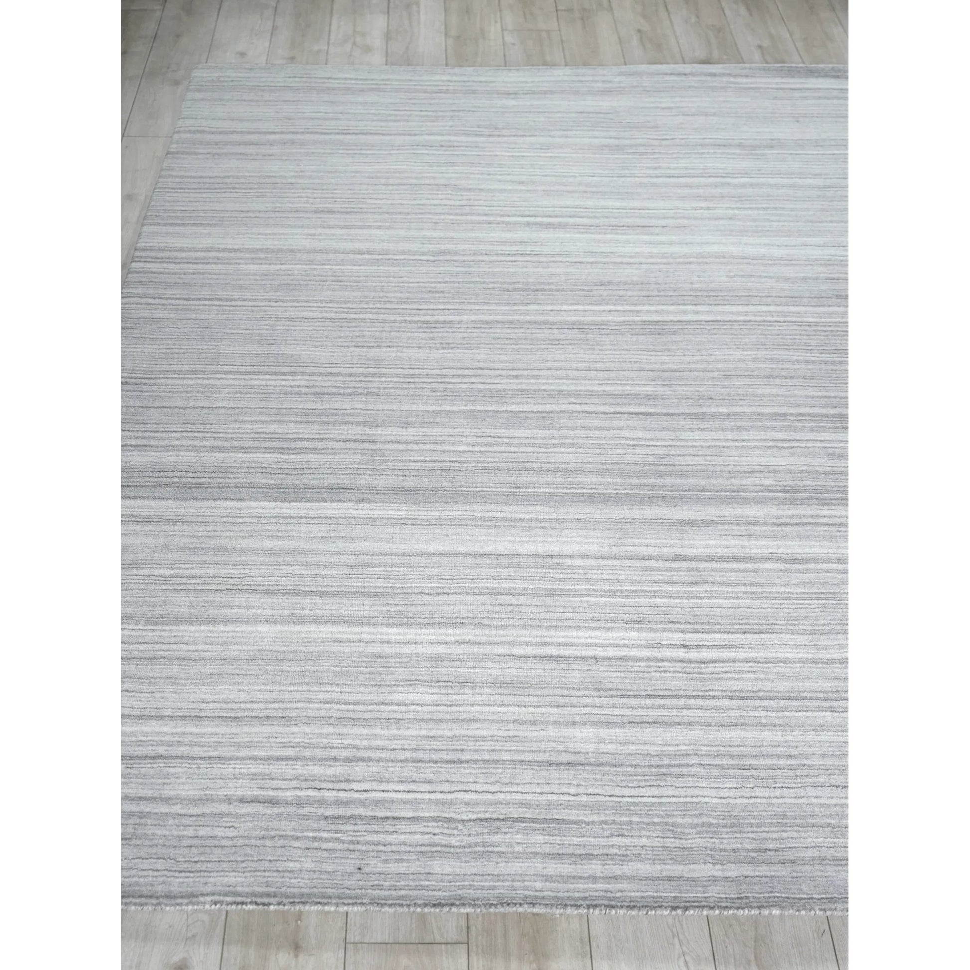 Serenity 7389 Indoor/Outdoor Rug by Exquisite Rugs in grey, silver. Made from pet in a unique style.