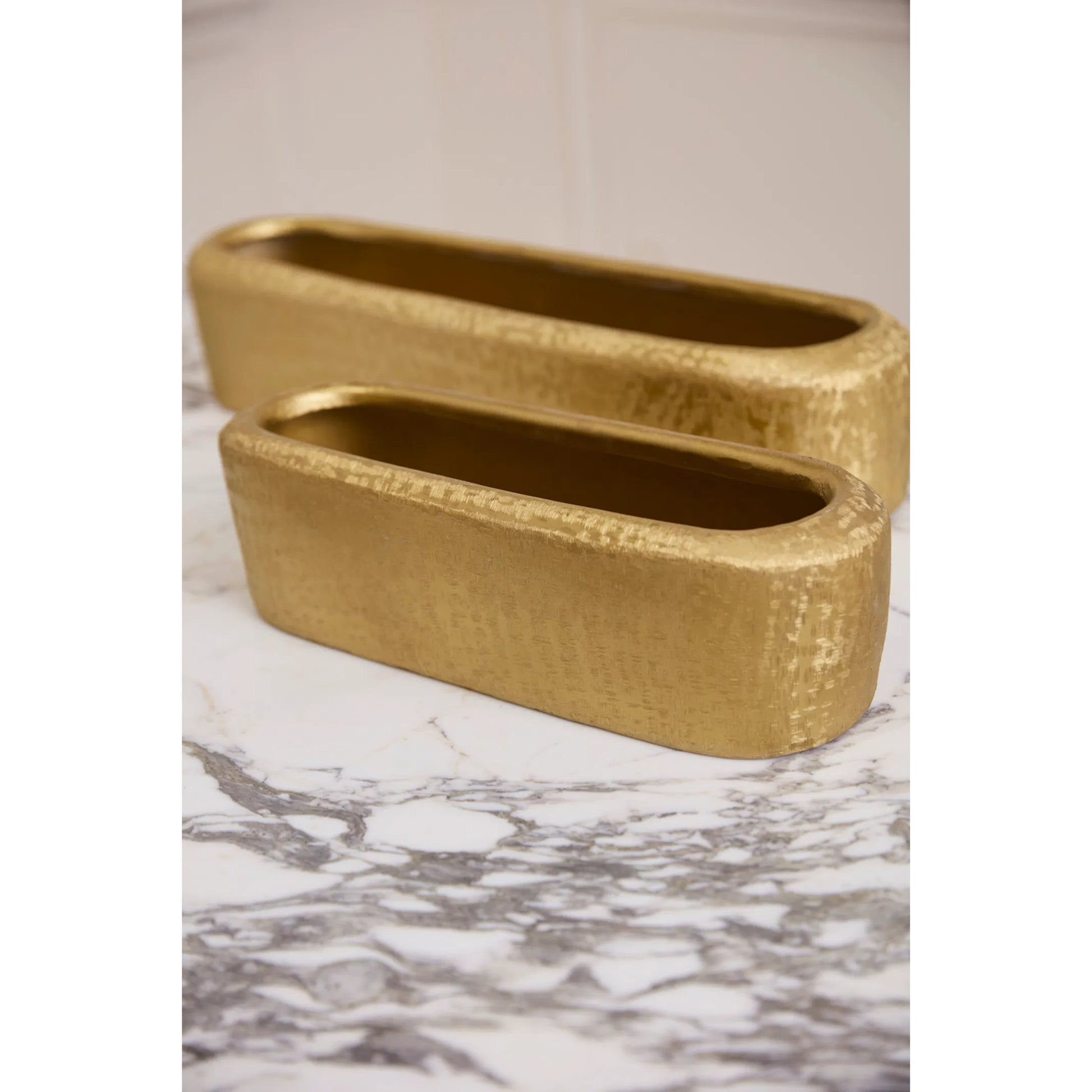 Blaze Trough by Accent Decor in gold. Made from metal in a unique style.