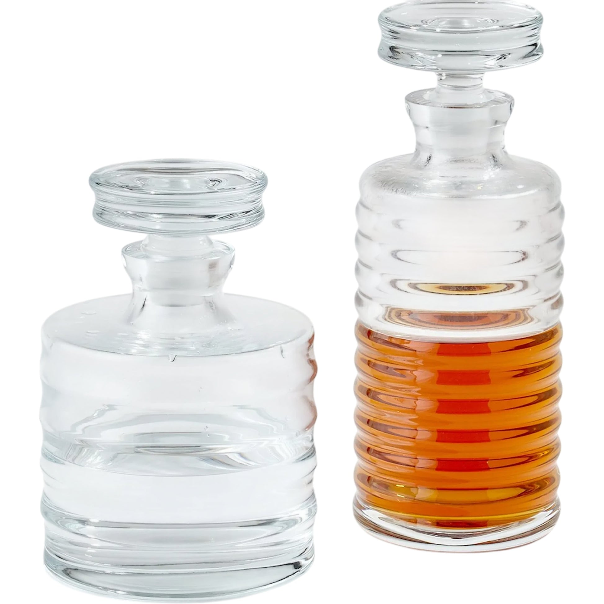 Ribbed Decanter by Global Views. Made from glass in a transitional style.