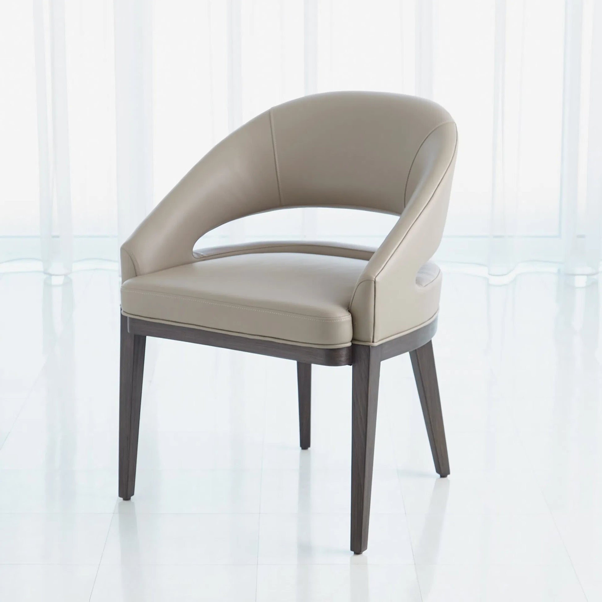 Alcott Dining Chair by Global Views. Made from beech wood, semi-aniline grey leather in a transitional style.