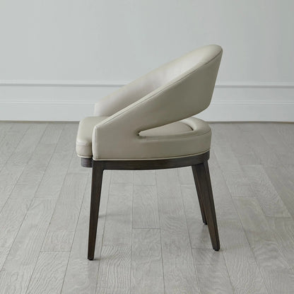 Alcott Dining Chair by Global Views. Made from beech wood, semi-aniline grey leather in a transitional style.