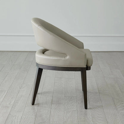Alcott Dining Chair by Global Views. Made from beech wood, semi-aniline grey leather in a transitional style.