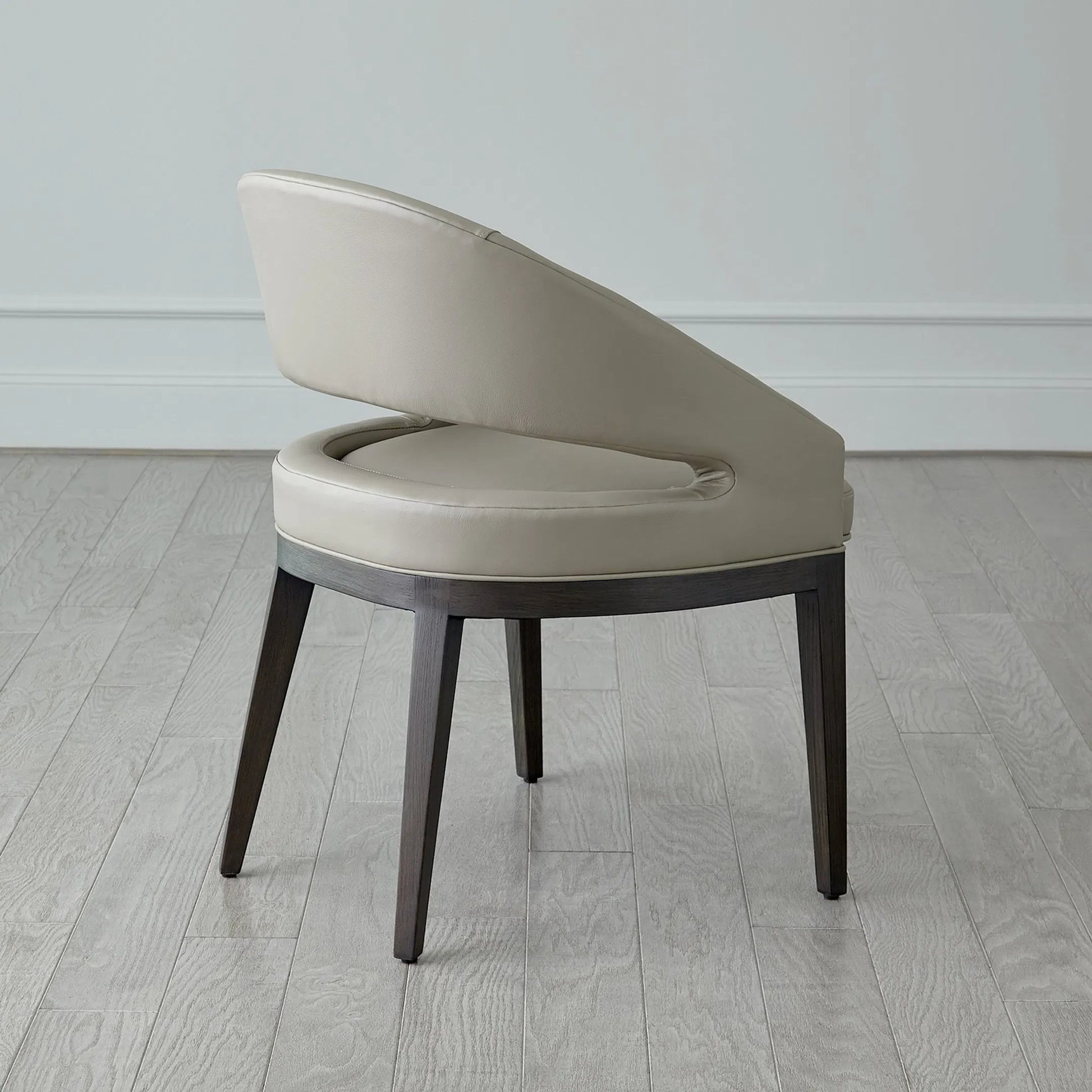 Alcott Dining Chair by Global Views. Made from beech wood, semi-aniline grey leather in a transitional style.