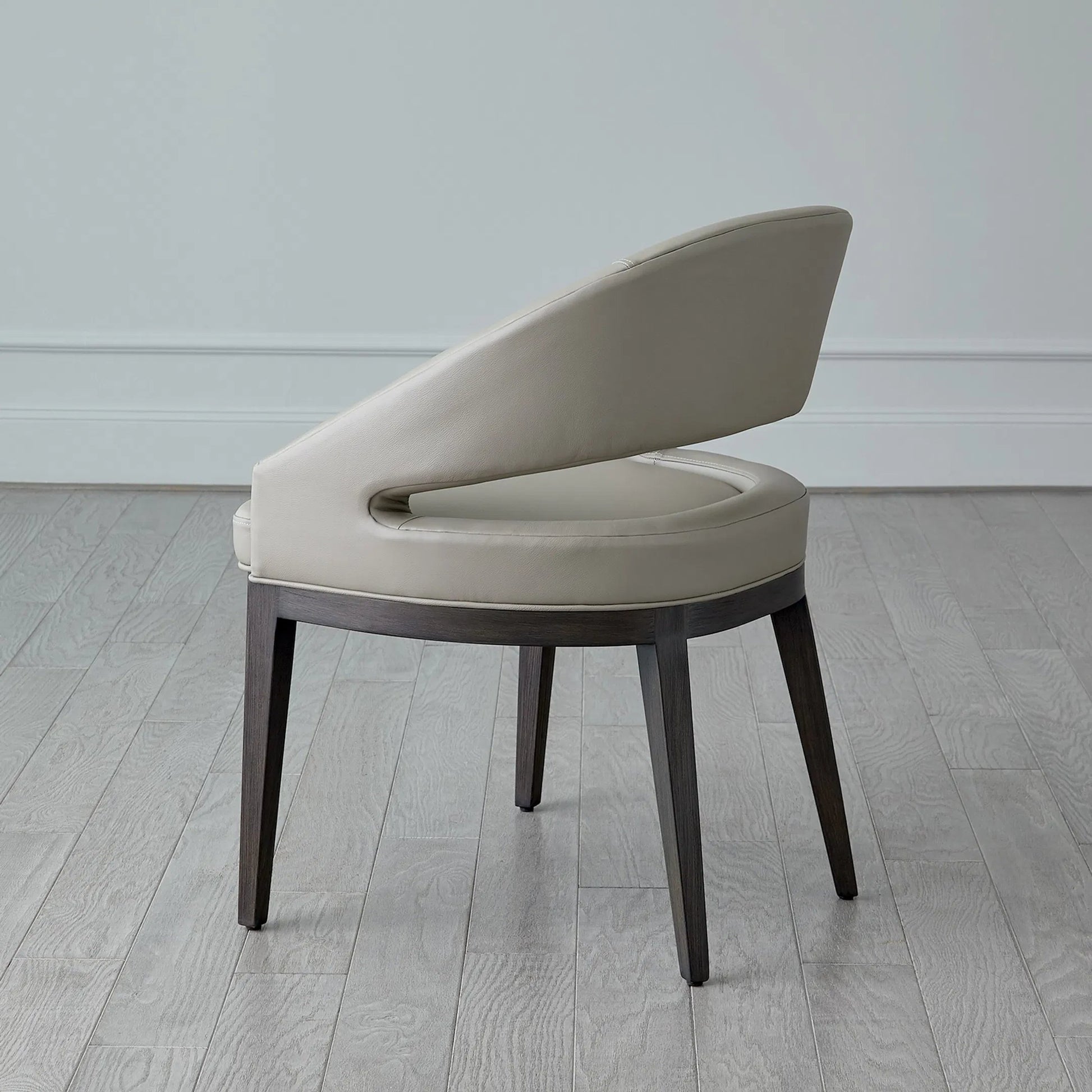 Alcott Dining Chair by Global Views. Made from beech wood, semi-aniline grey leather in a transitional style.