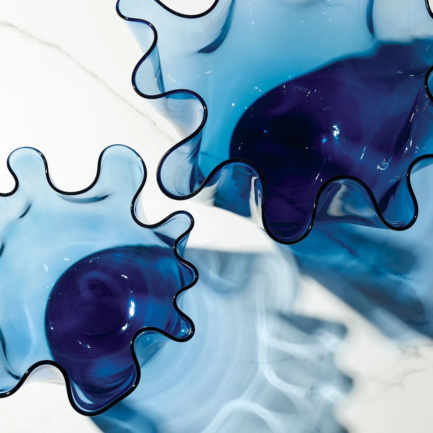 008 SI-2445556,SI-2445557 | Closeup | Handkerchief Vase by Global Views. Made from art glass in a eclectic & global style.