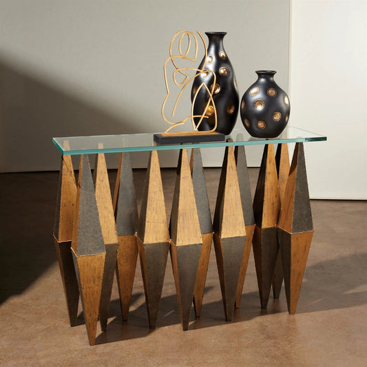 Harlequin Console by Global Views in gold. Made from unique in a modern style.