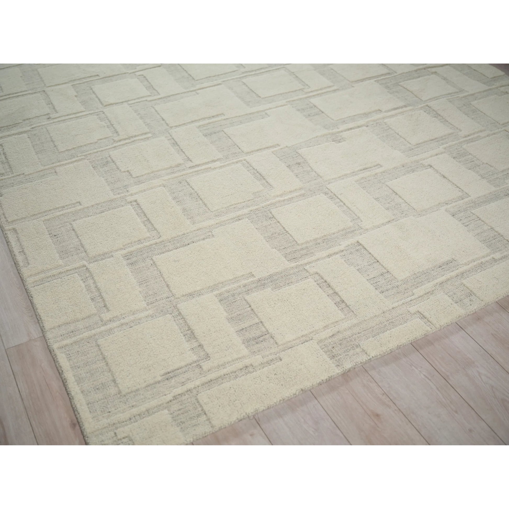 Malmo 7497 Rug by Exquisite Rugs in ivory, beige, taupe. Made from new zealand wool in a unique style.