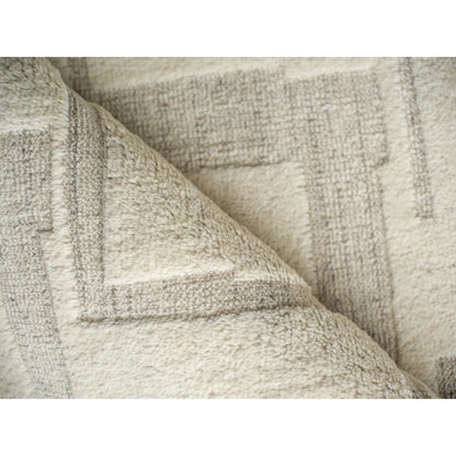 Malmo 7497 Rug by Exquisite Rugs in ivory, beige, taupe. Made from new zealand wool in a unique style.