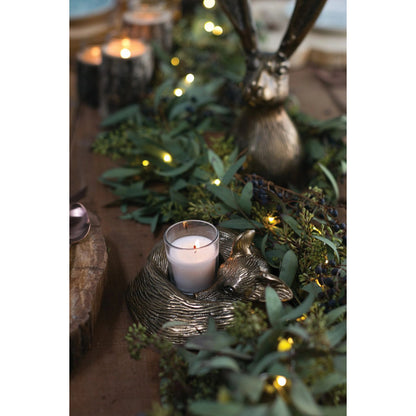 E+E Sleepy Eloise Candleholder by Accent Decor in gold. Made from metal in a traditional style.