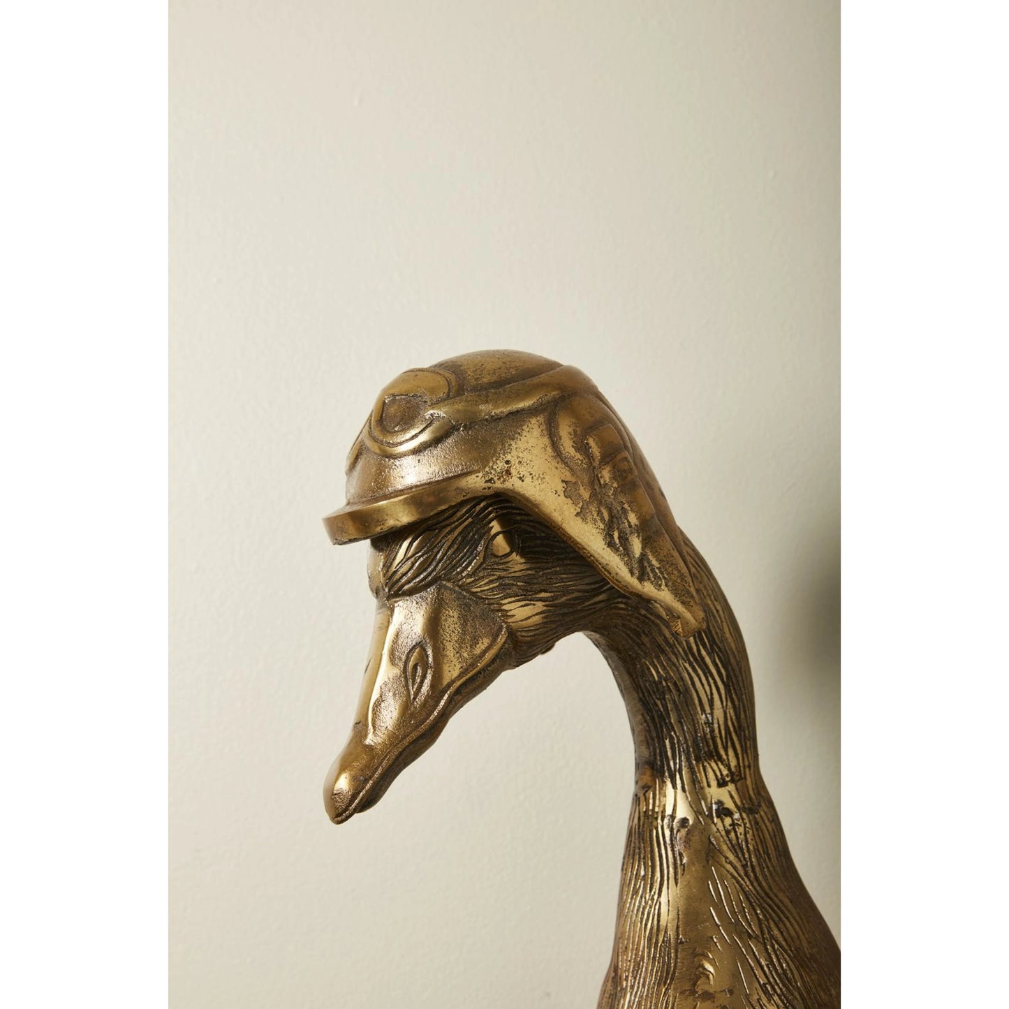 002 SI-2083701 | Closeup | E+E Wall Mount Charlie by Accent Decor in antique-gold. Made from metal in a modern style.
